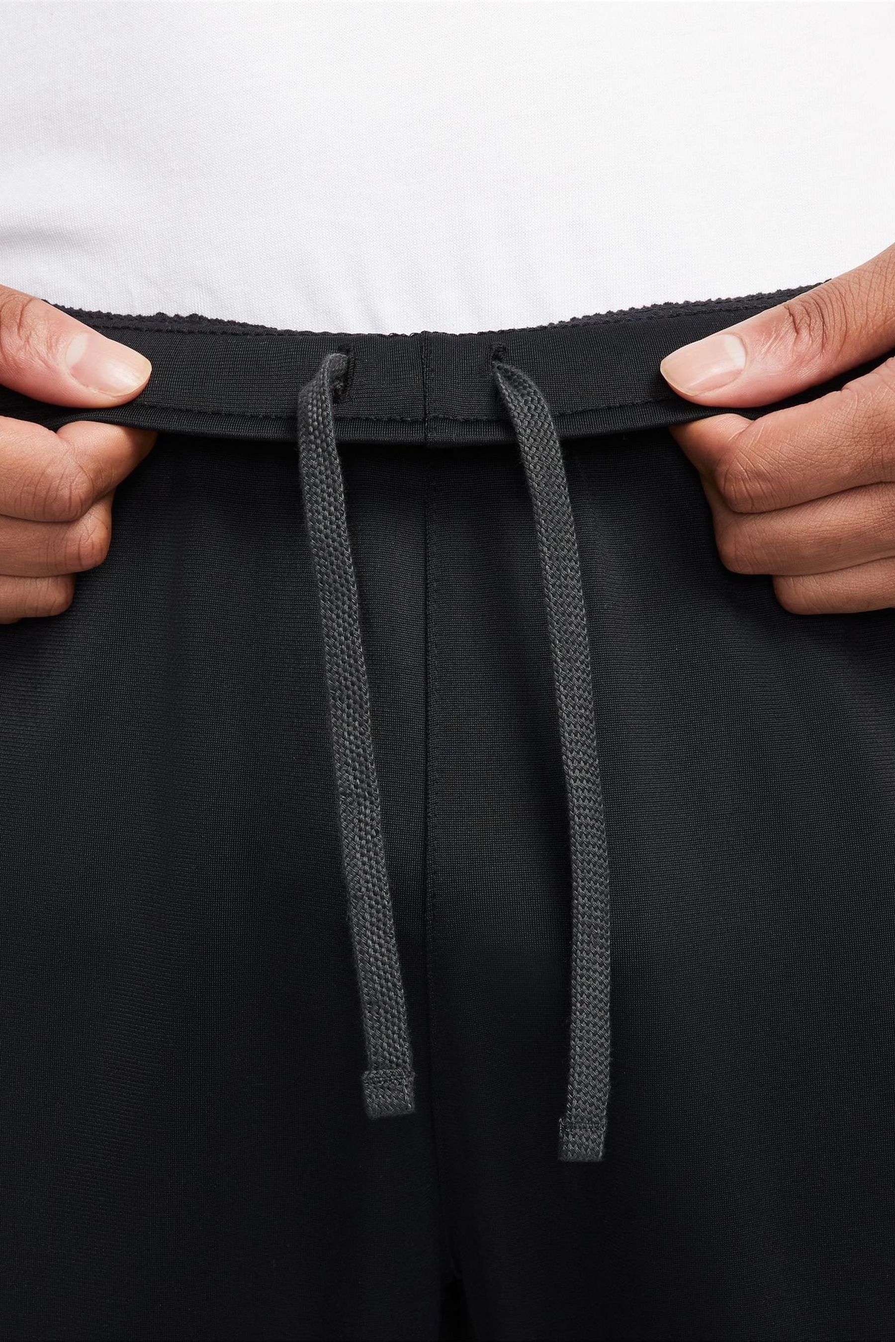 Nike polyknit track pants in black discount