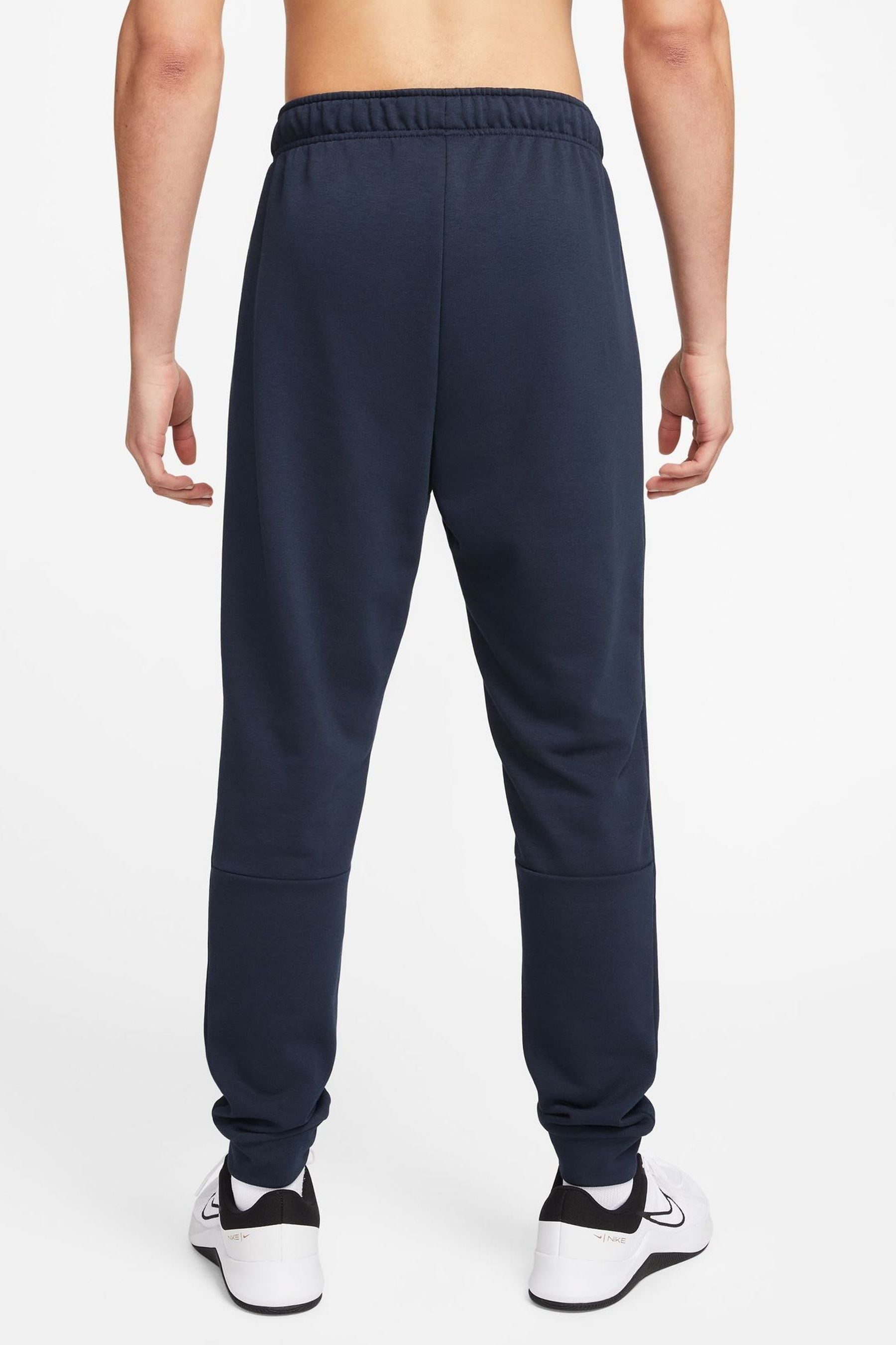 Buy Nike Navy Dri FIT Tapered Training Joggers from the Next UK