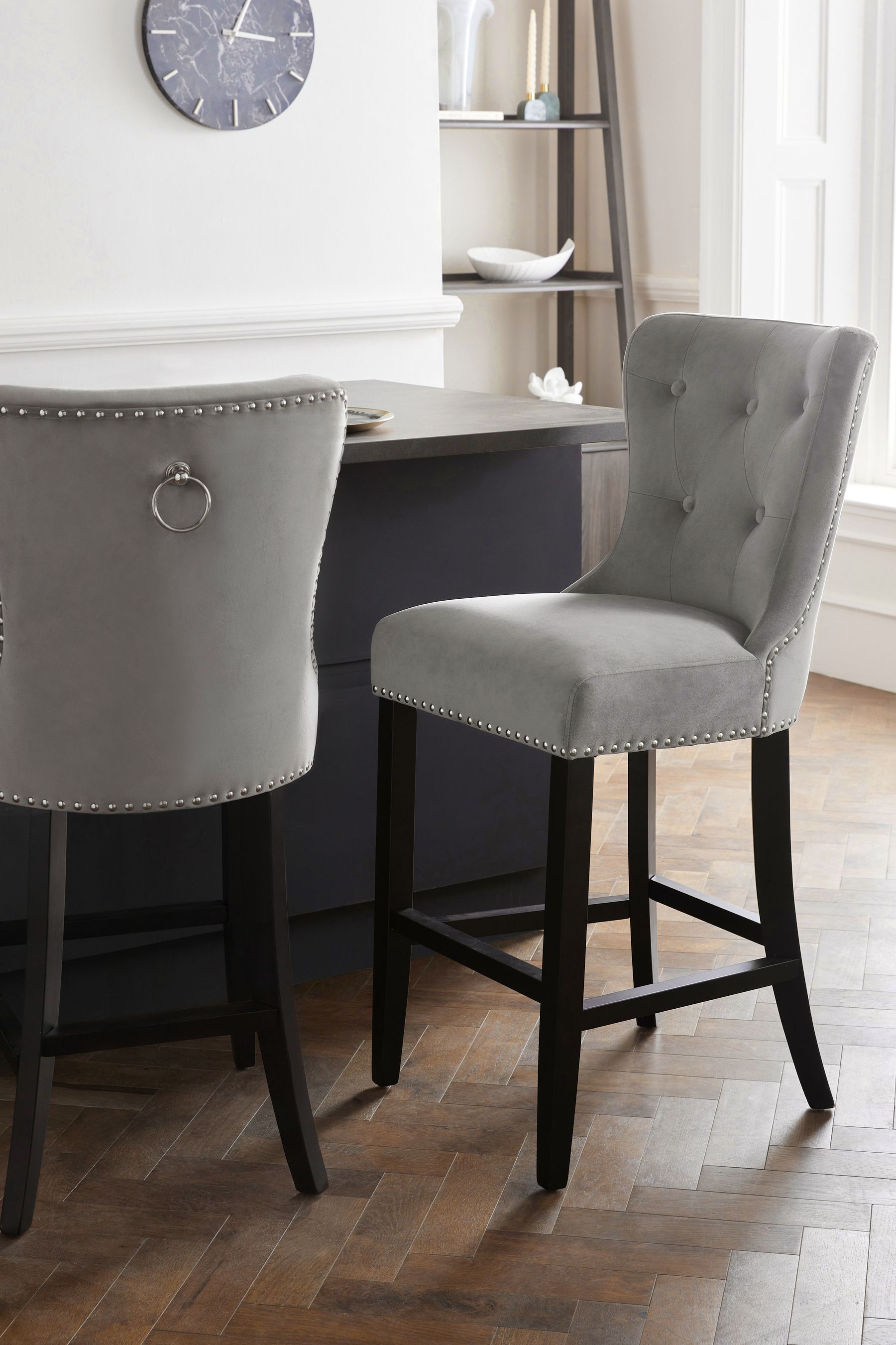 Grey bar stool top with black legs