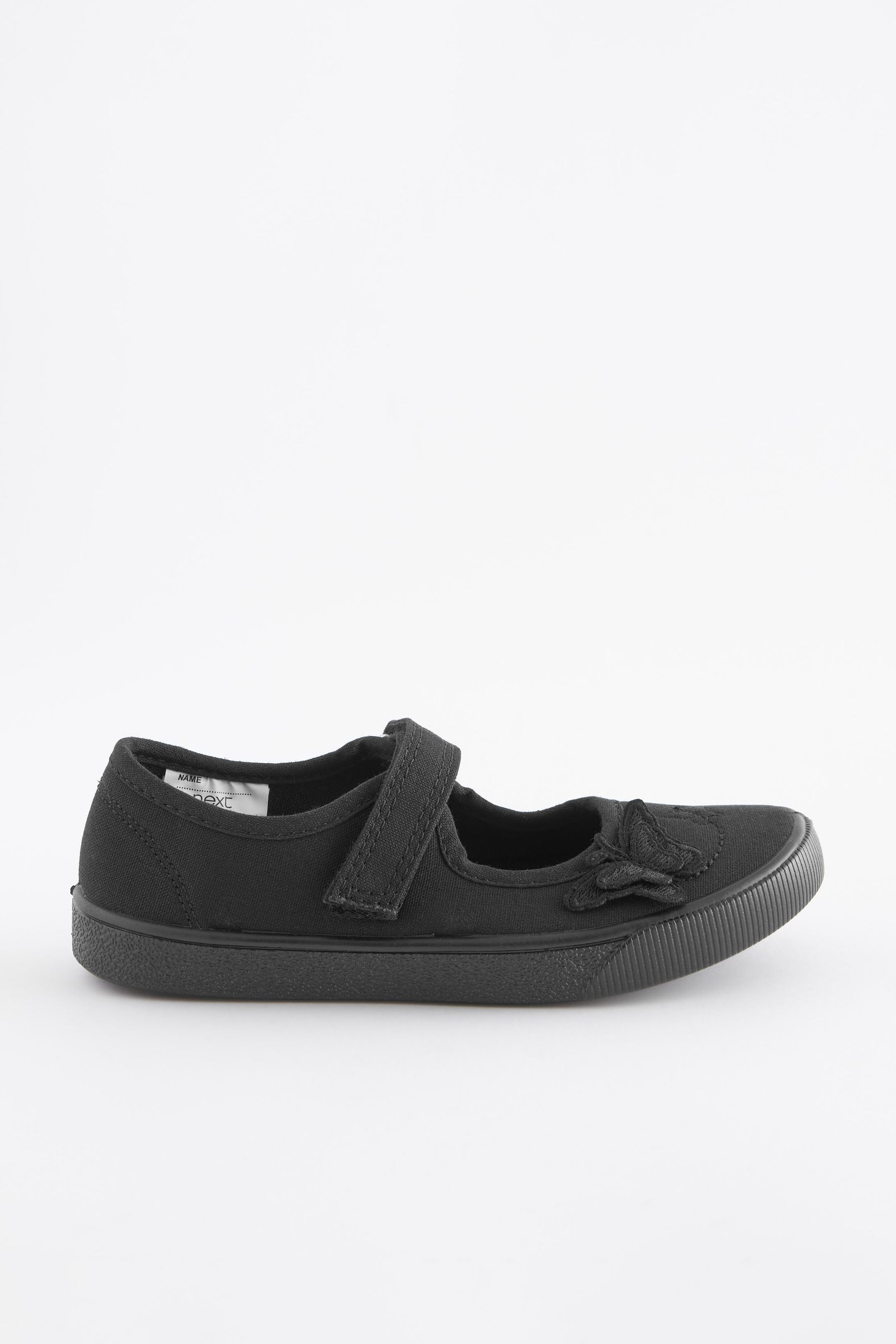 Buy Black Wide Fit G Butterfly Embroidered School Plimsoll Shoes from the Next UK online shop