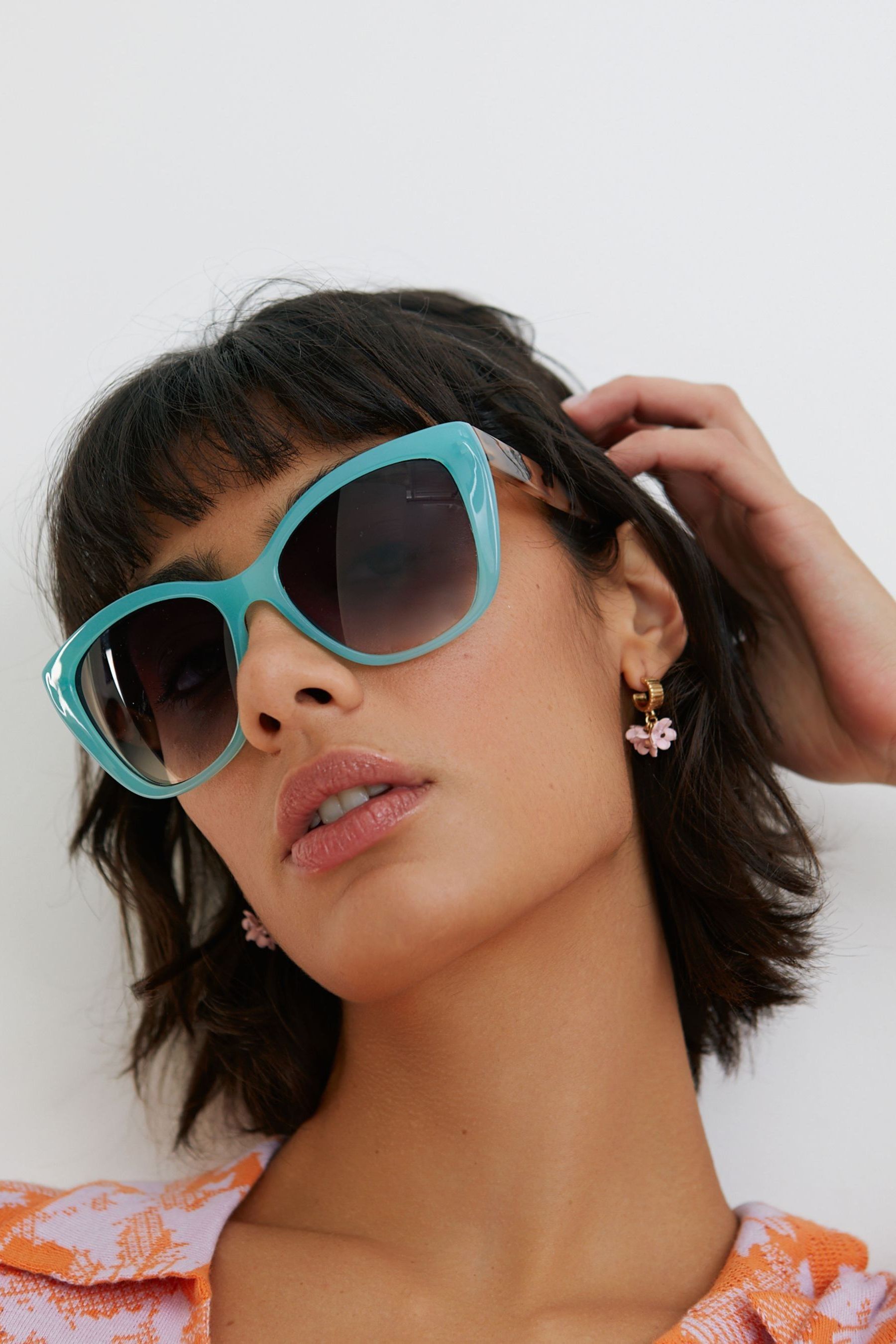 Turquoise cat eye sunglasses top