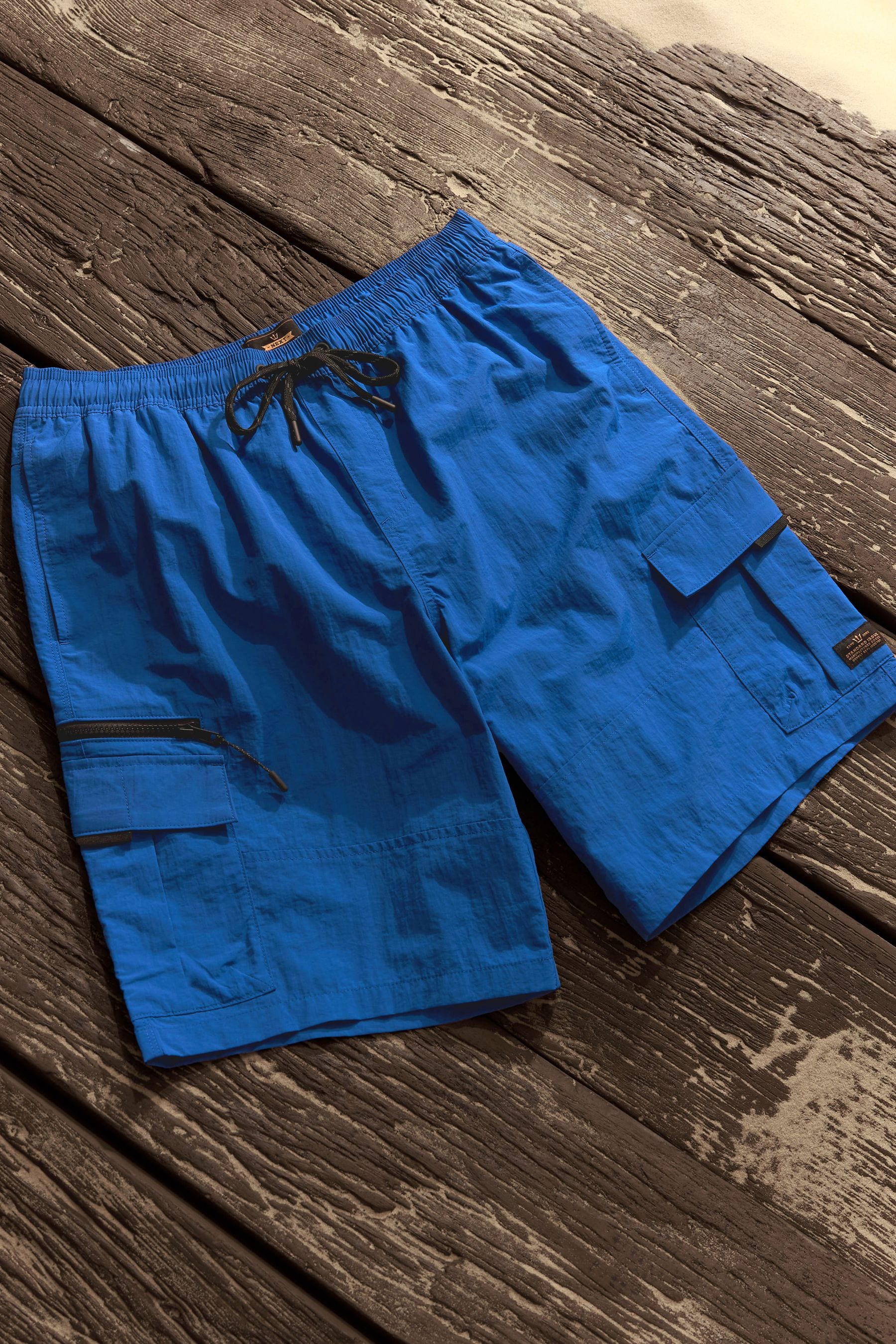 Belted swim trunks sale
