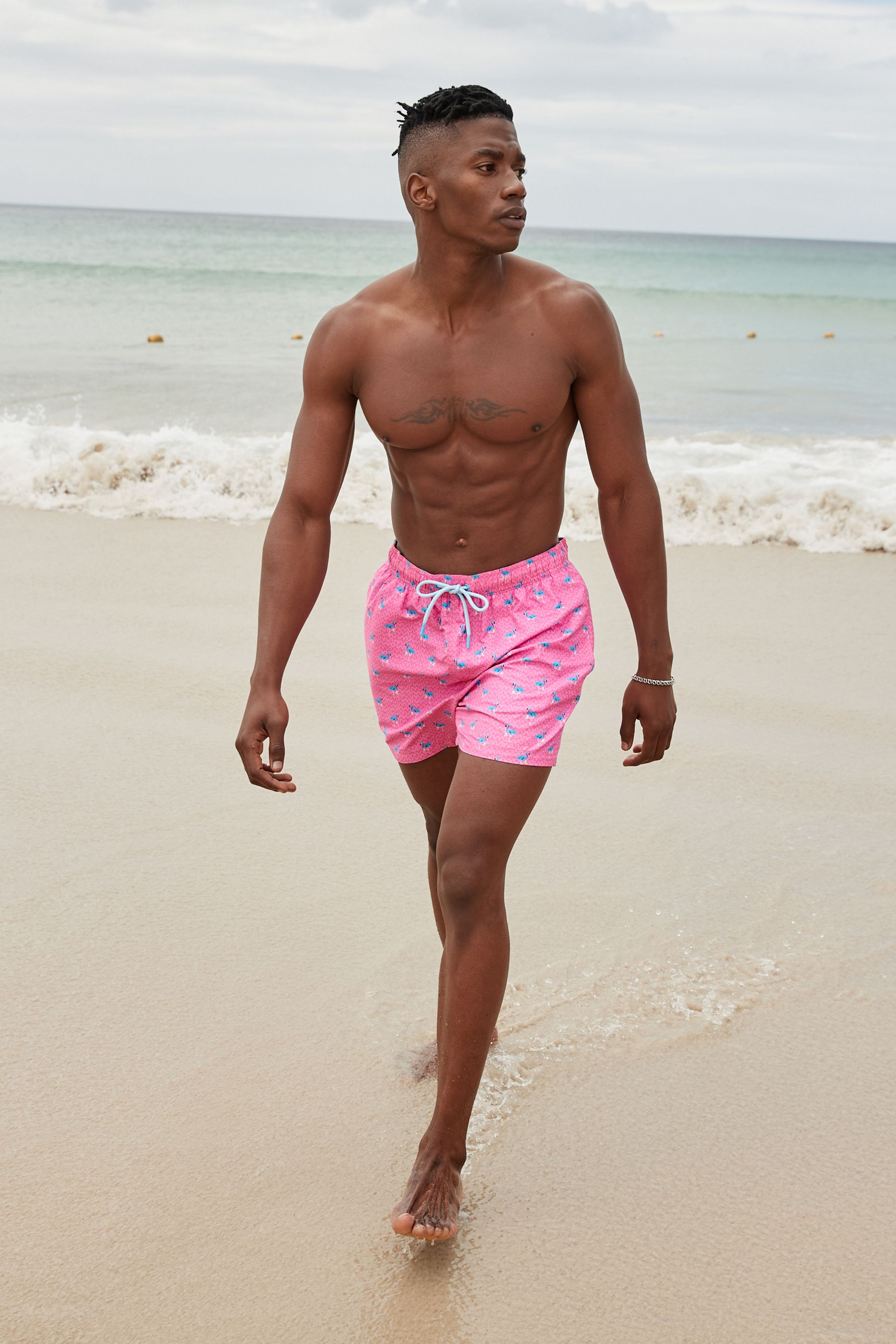 Buy Bright Pink Mini Flamingo Regular Fit Printed Swim Shorts from the Next UK online shop