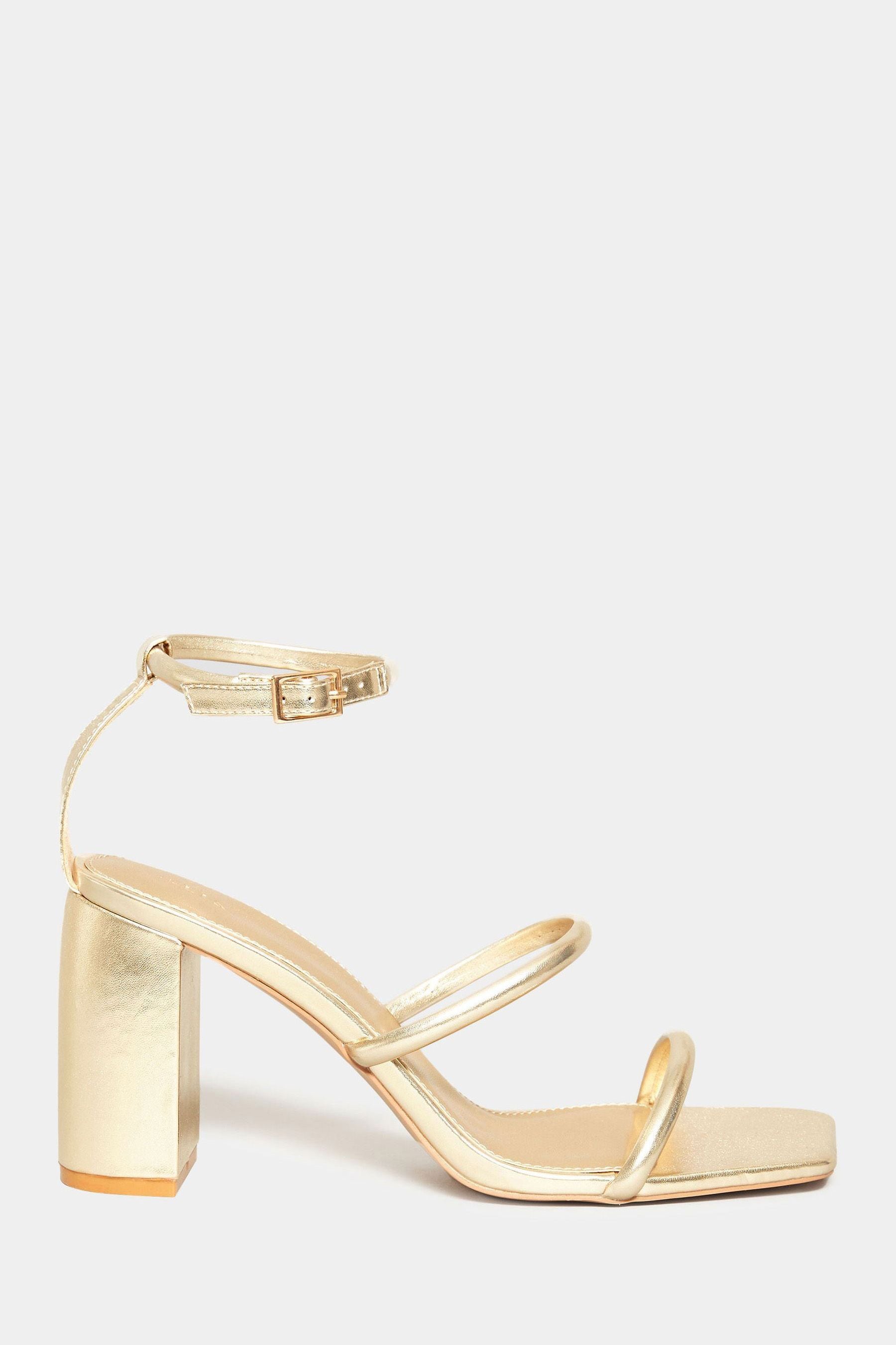Tall gold heels top