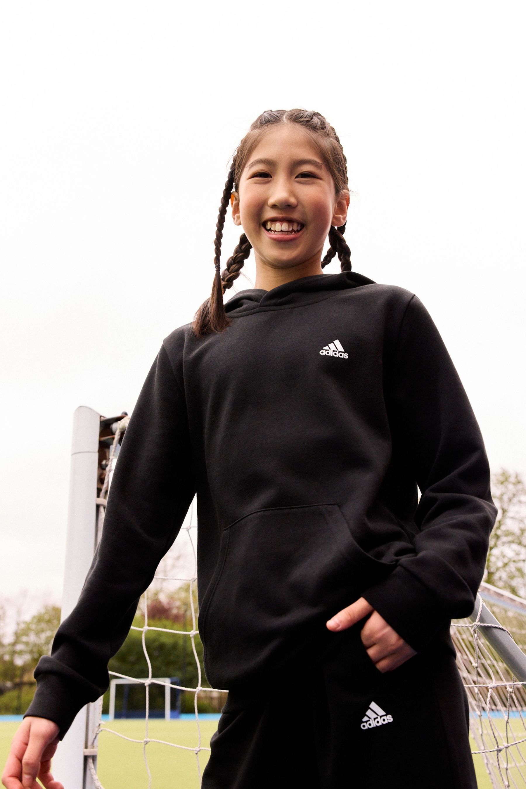Buy adidas Black Kids Essentials Small Logo Feel Cozy Fleece Hoodie from the Next UK online shop