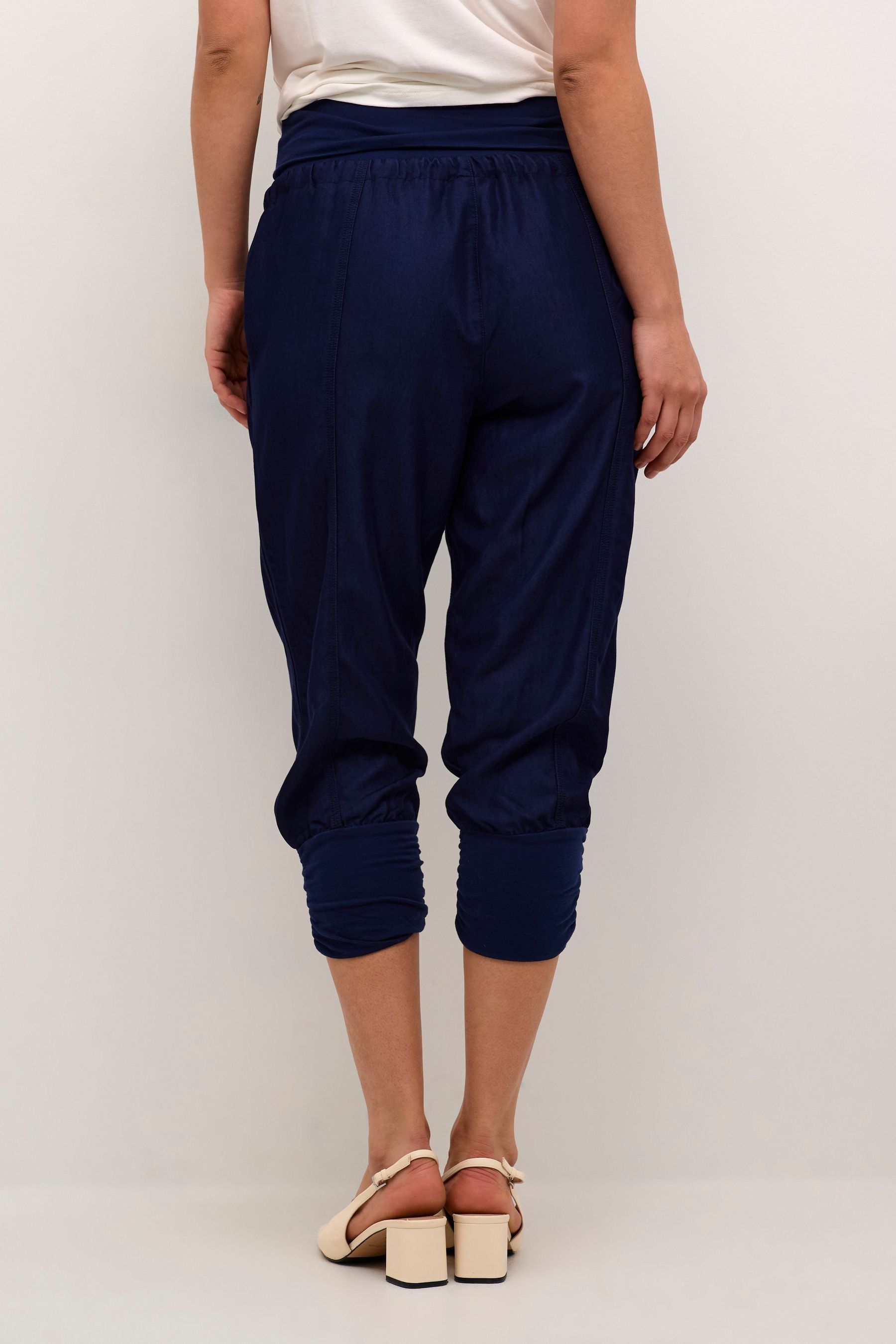 Cream capri trousers shop