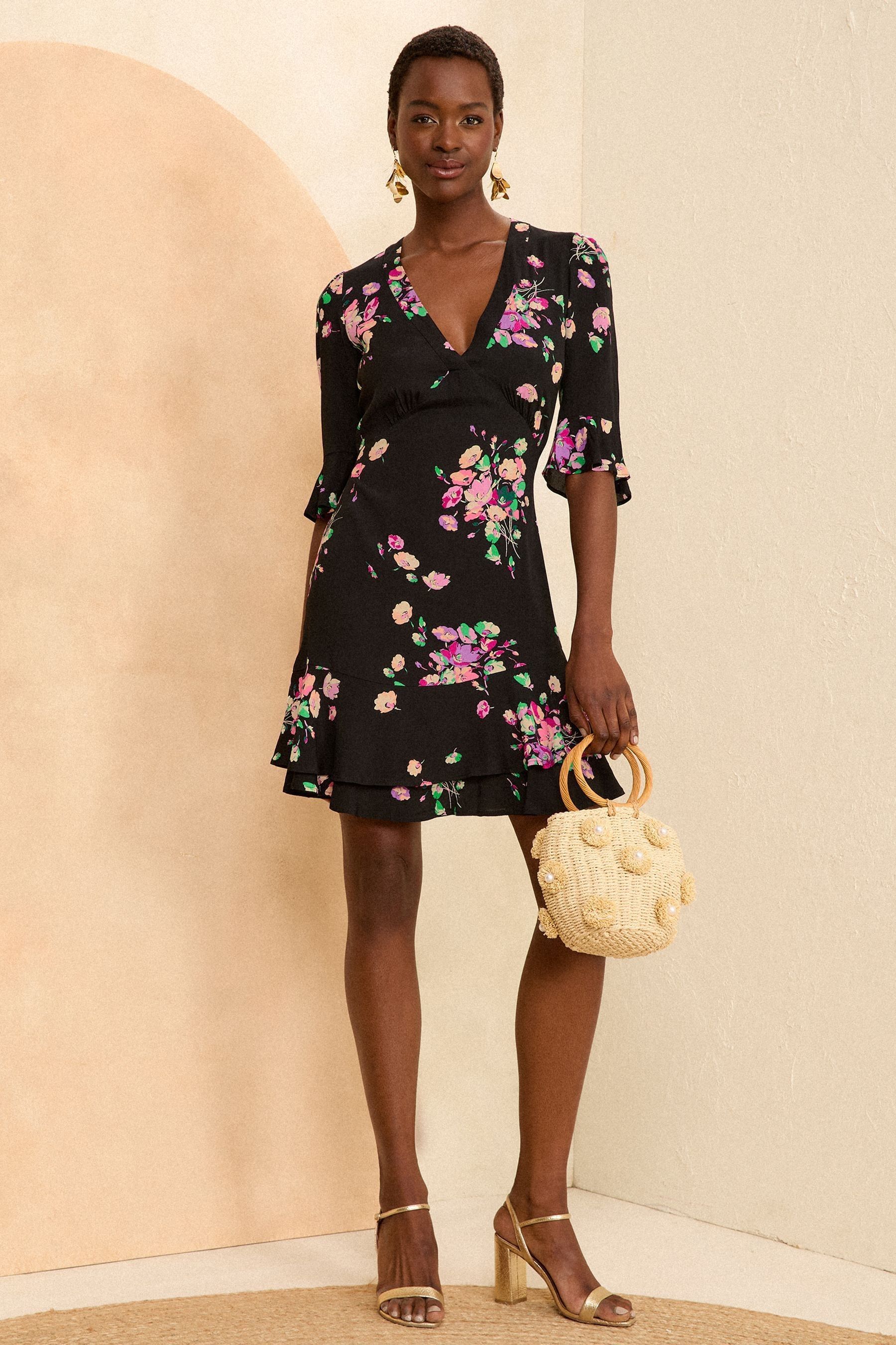 Buy Love Roses Black Floral Printed Twist Flute Sleeve Mini Dress from the Next UK online shop