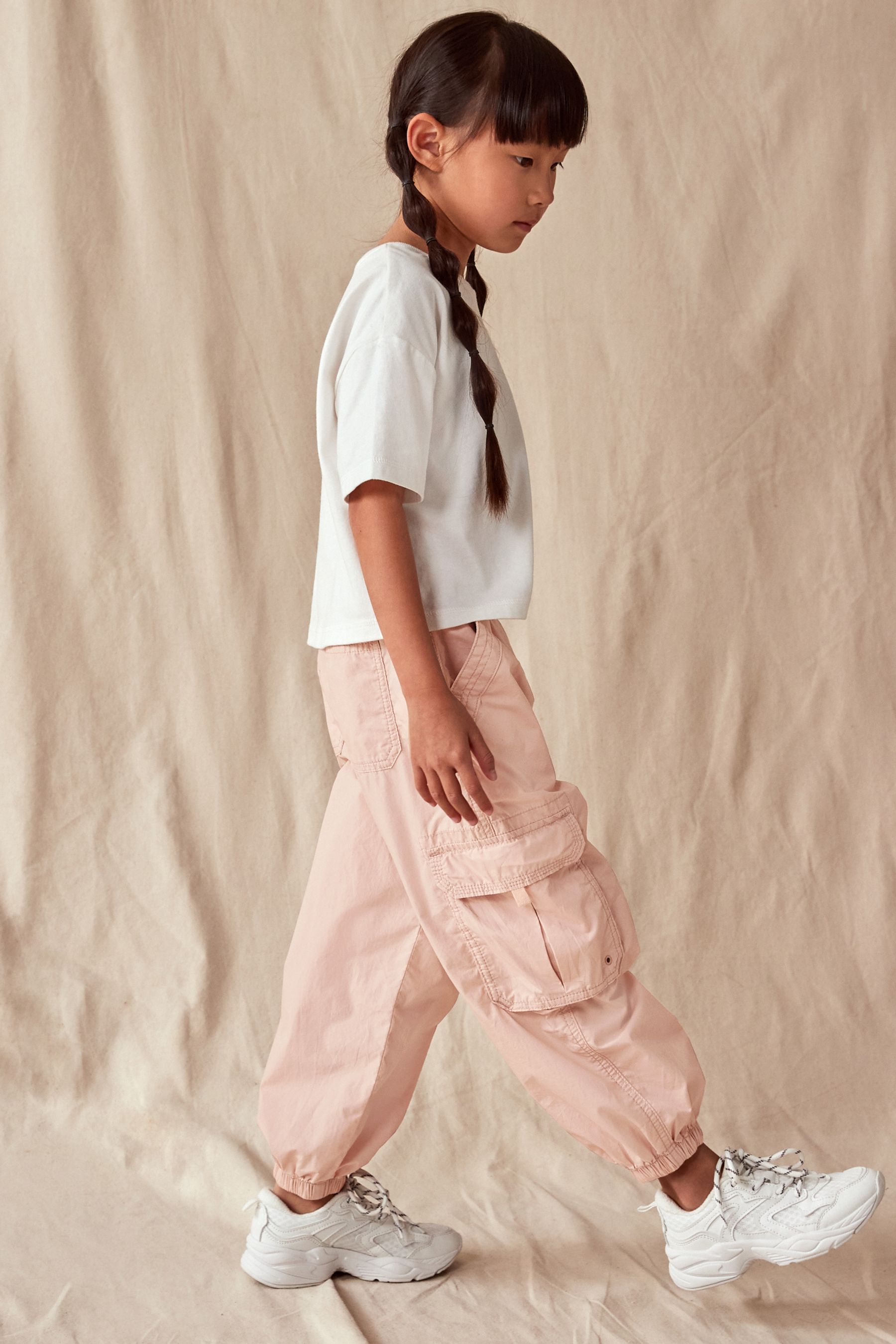 Buy Light Pink Parachute Cargo Trousers 3 16yrs from the Next UK