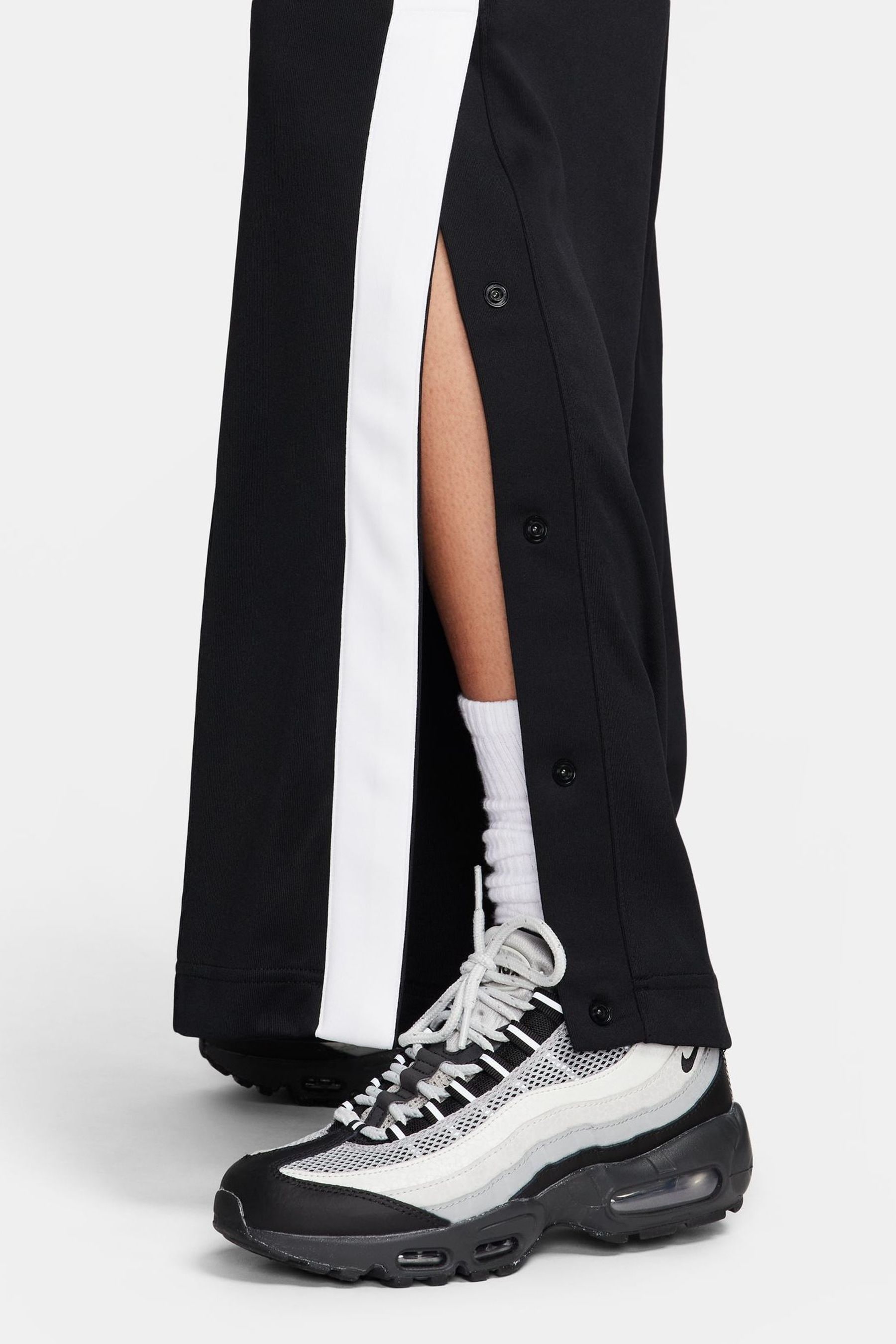Nike pinstripe joggers in black 2025