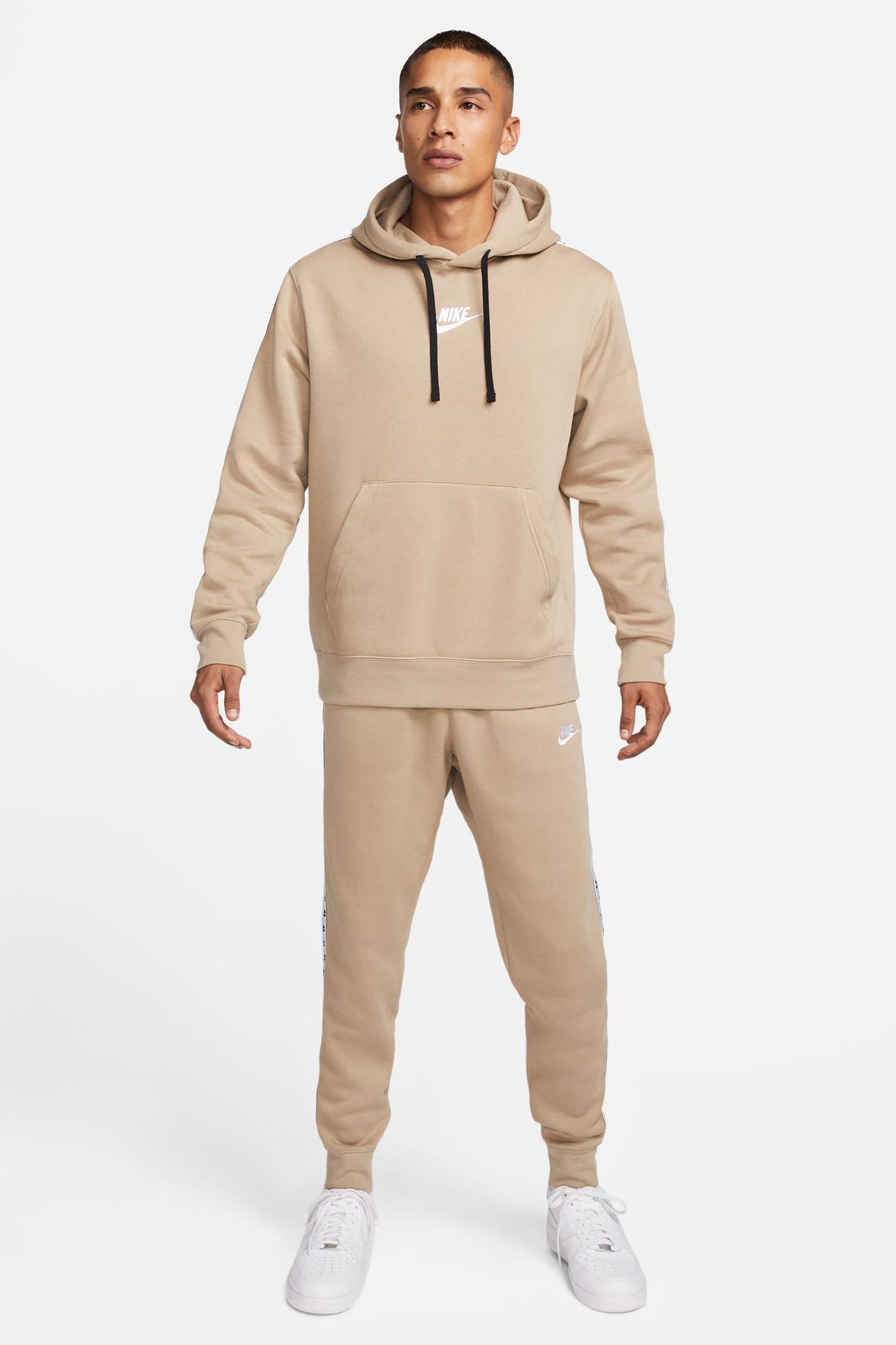 Beige nike tracksuit hotsell