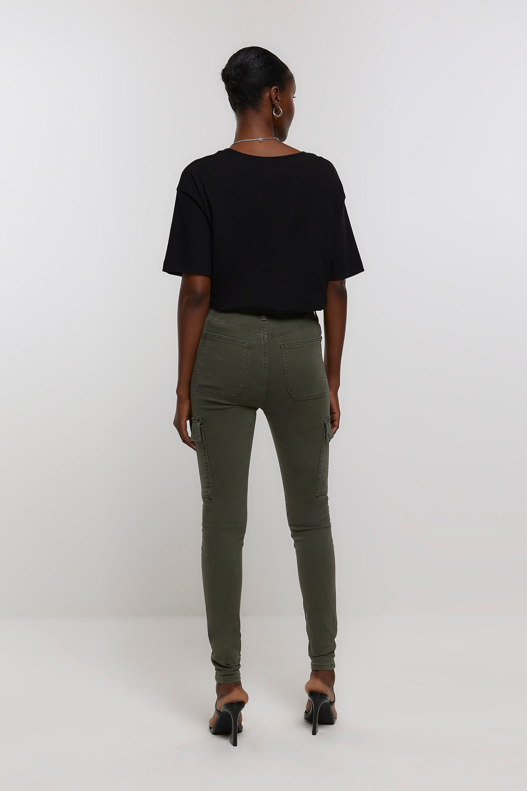 Green high waisted skinny sales jeans