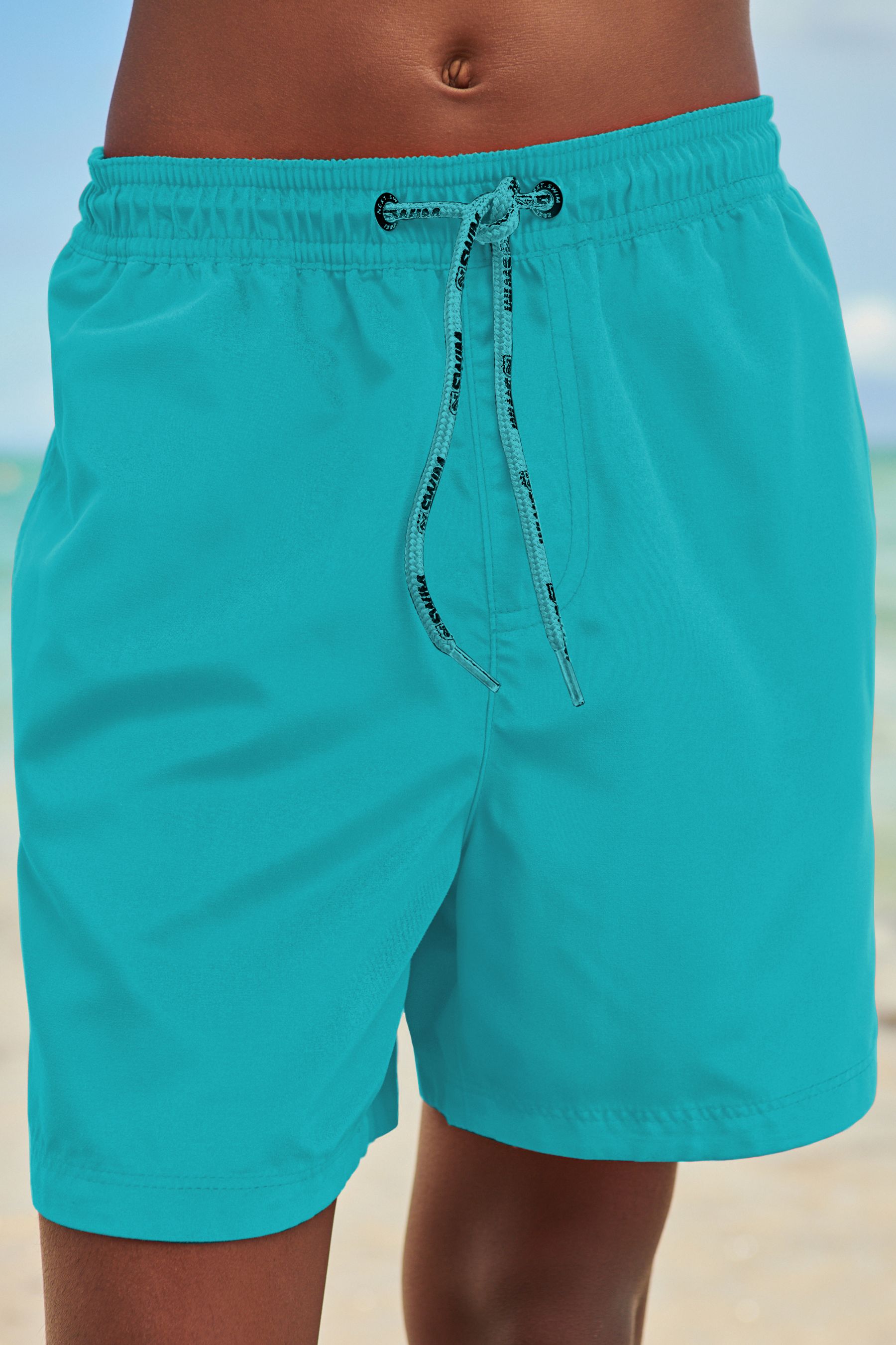 Turquoise swim shorts shop