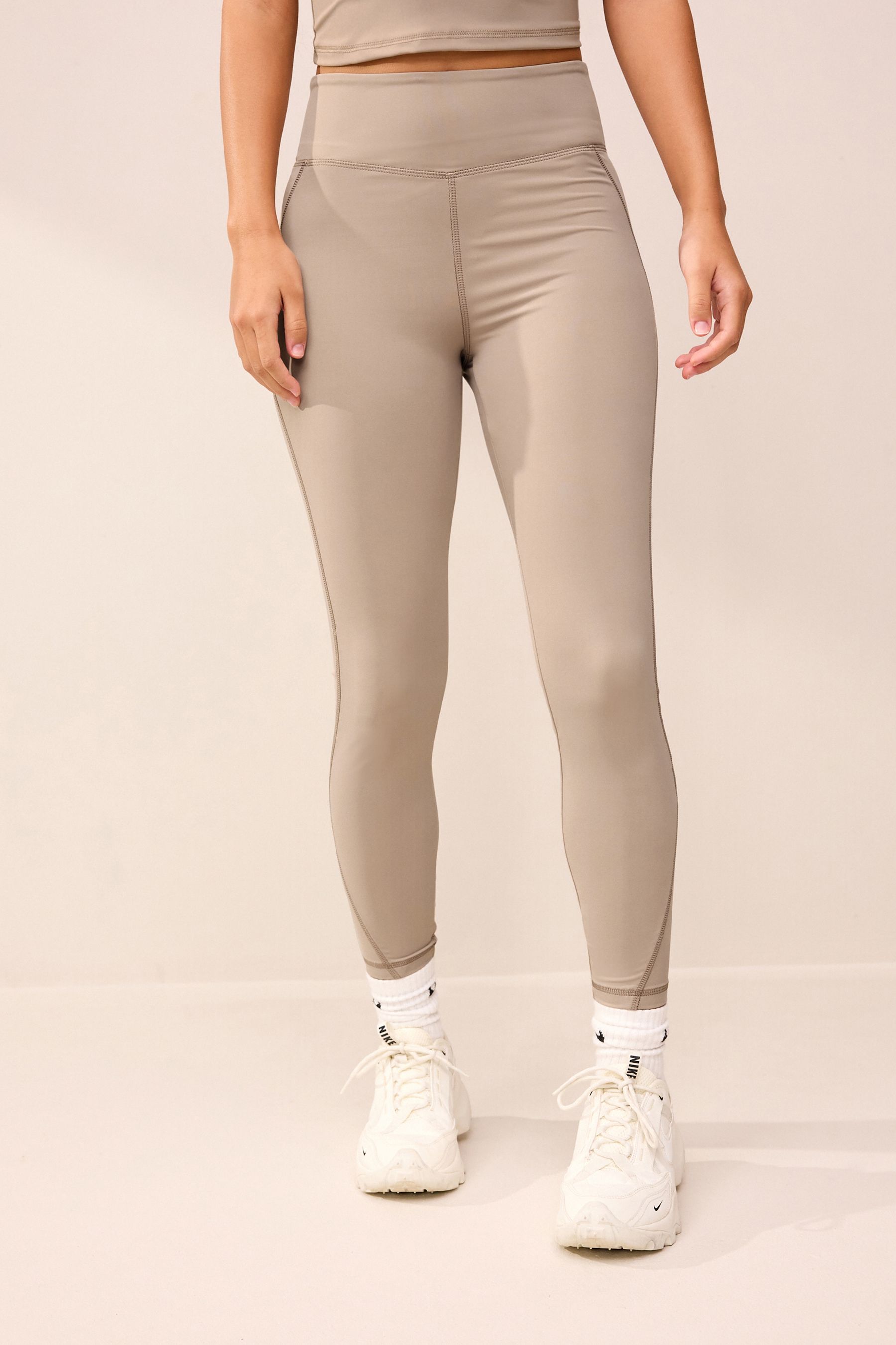 Beige nike leggings best sale