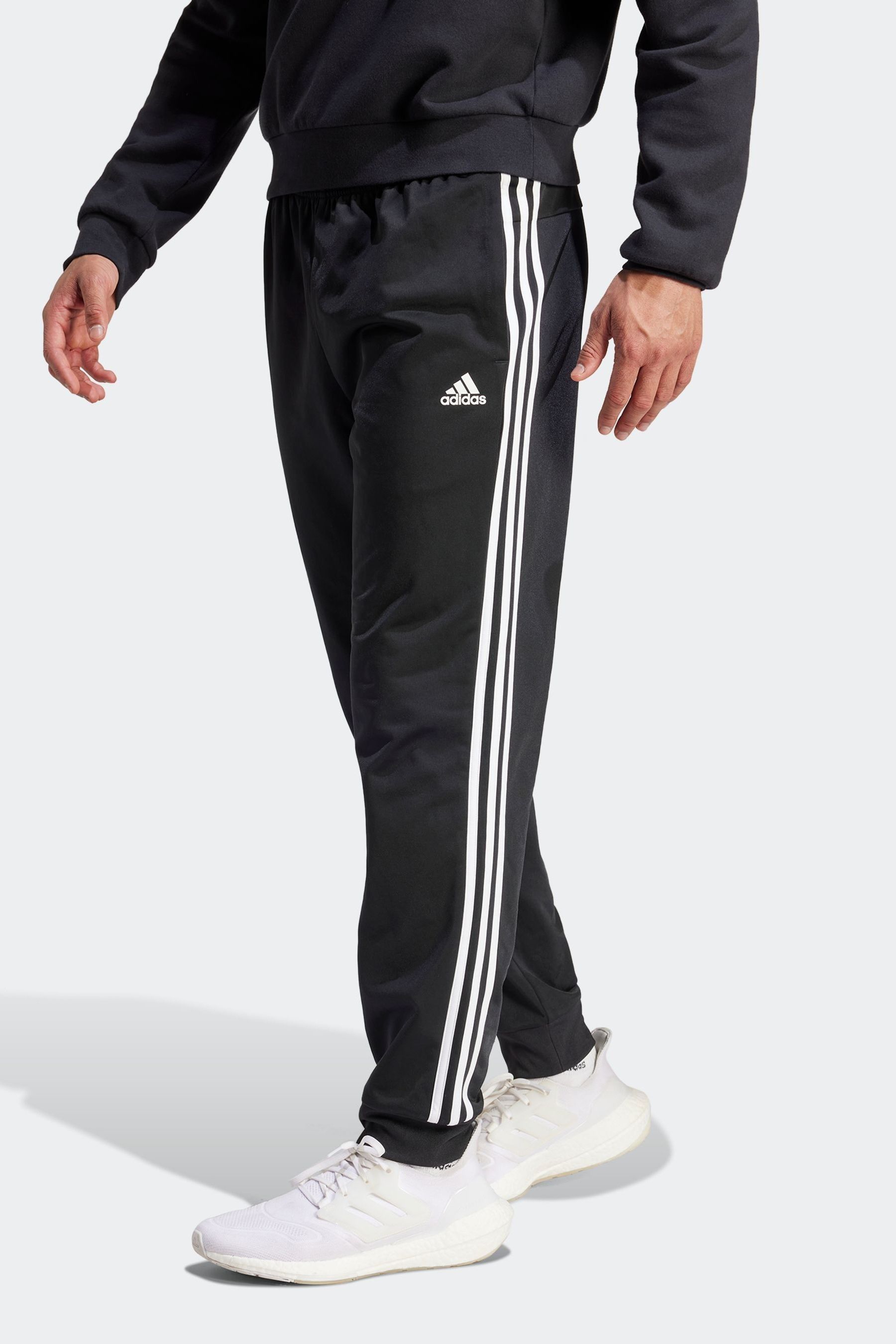 Buy adidas Dark Black Sportswear Essentials Warm Up Tapered 3 Stripes Joggers from the Next UK online shop