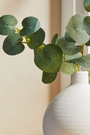 Green Artificial Eucalyptus In White Vase