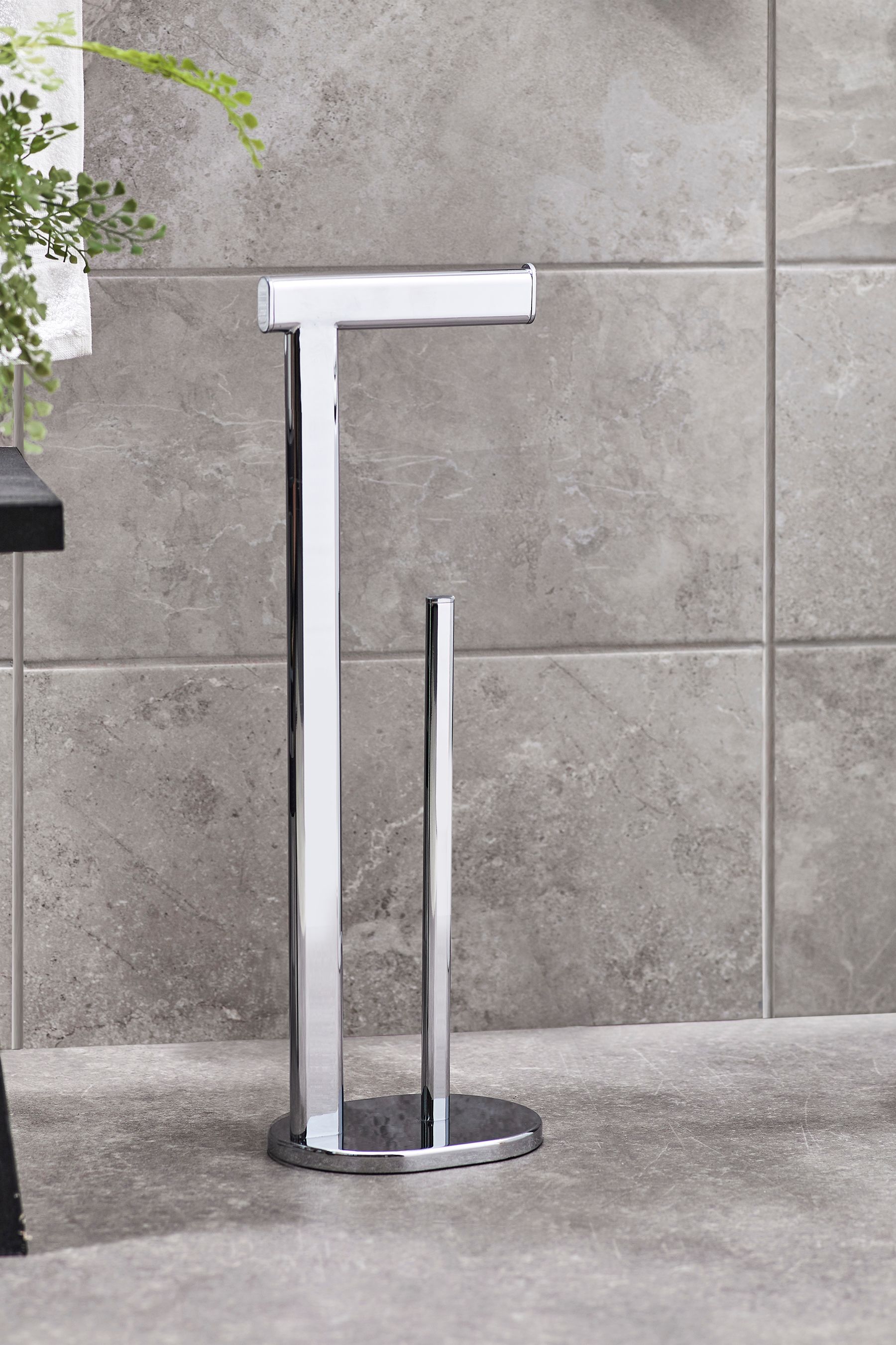 Grey freestanding store toilet roll holder