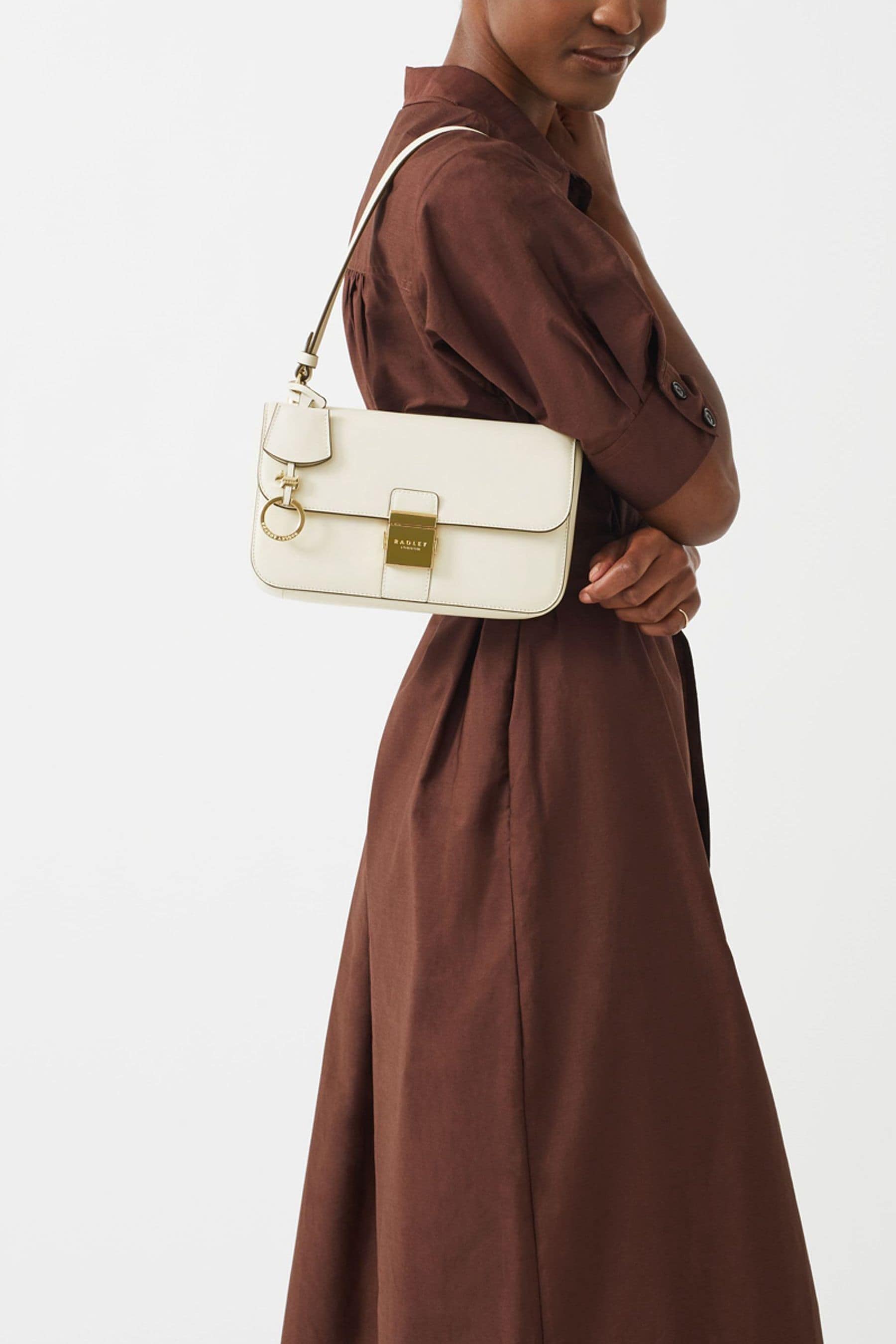 Flapover store shoulder bag