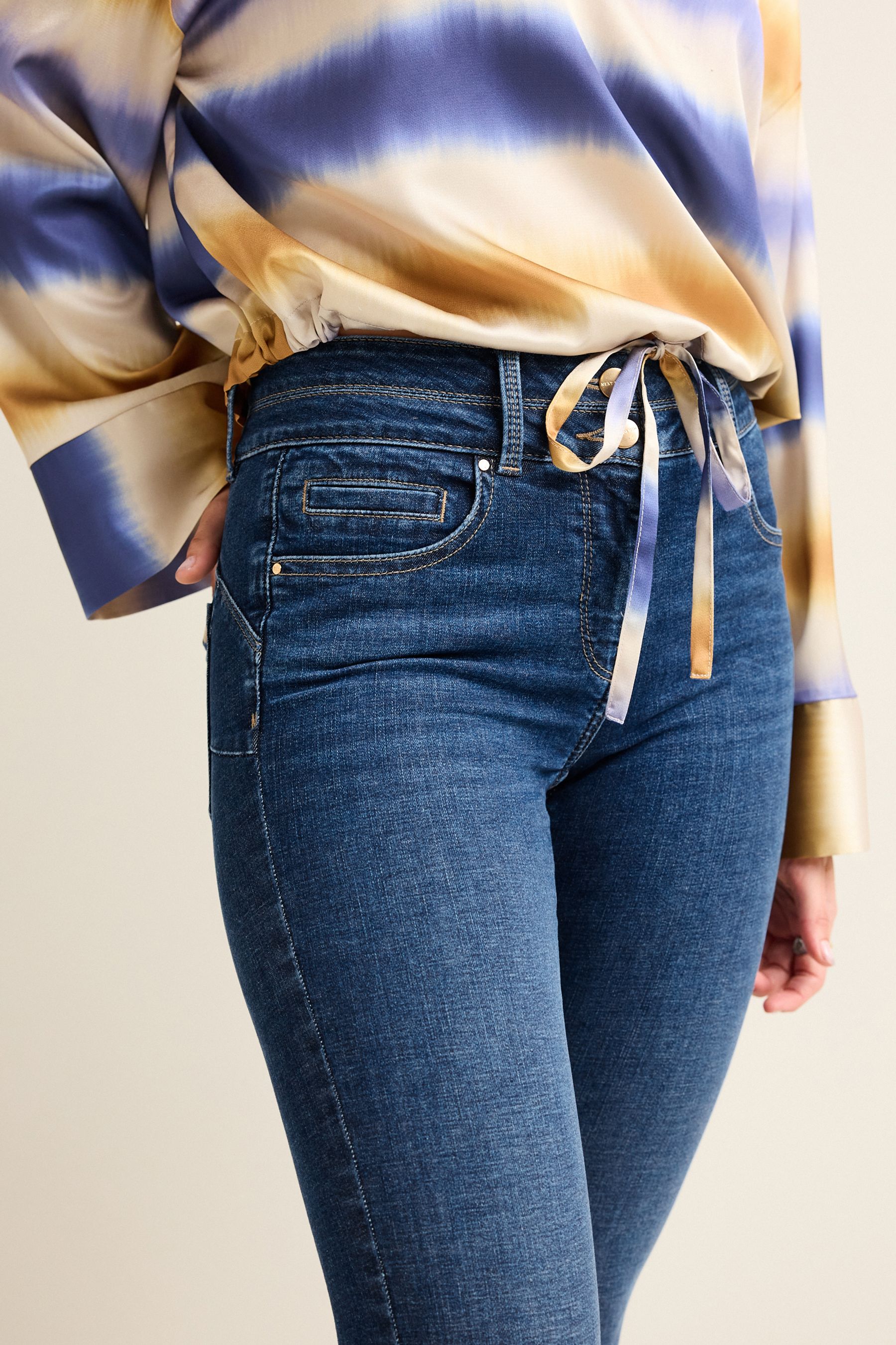 Buy Mid Blue Wash Lift Slim And Shape Skinny Jeans from the Next