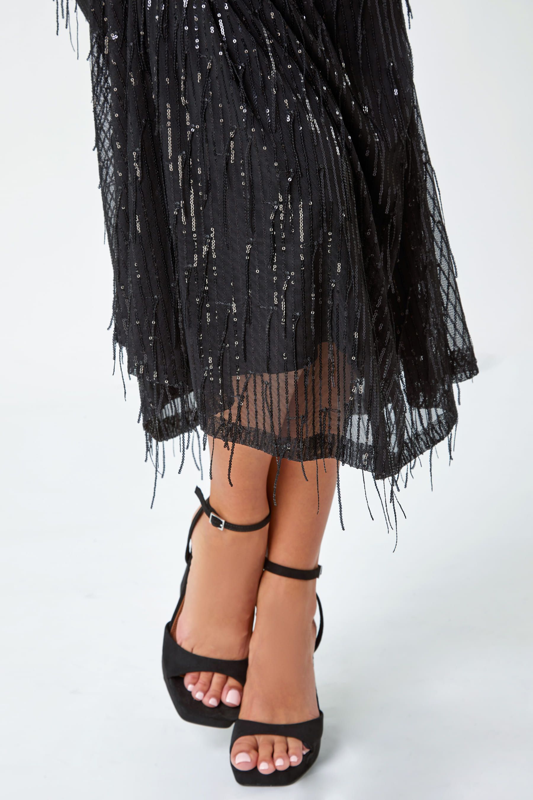 Black dress with tassels at the bottom clearance
