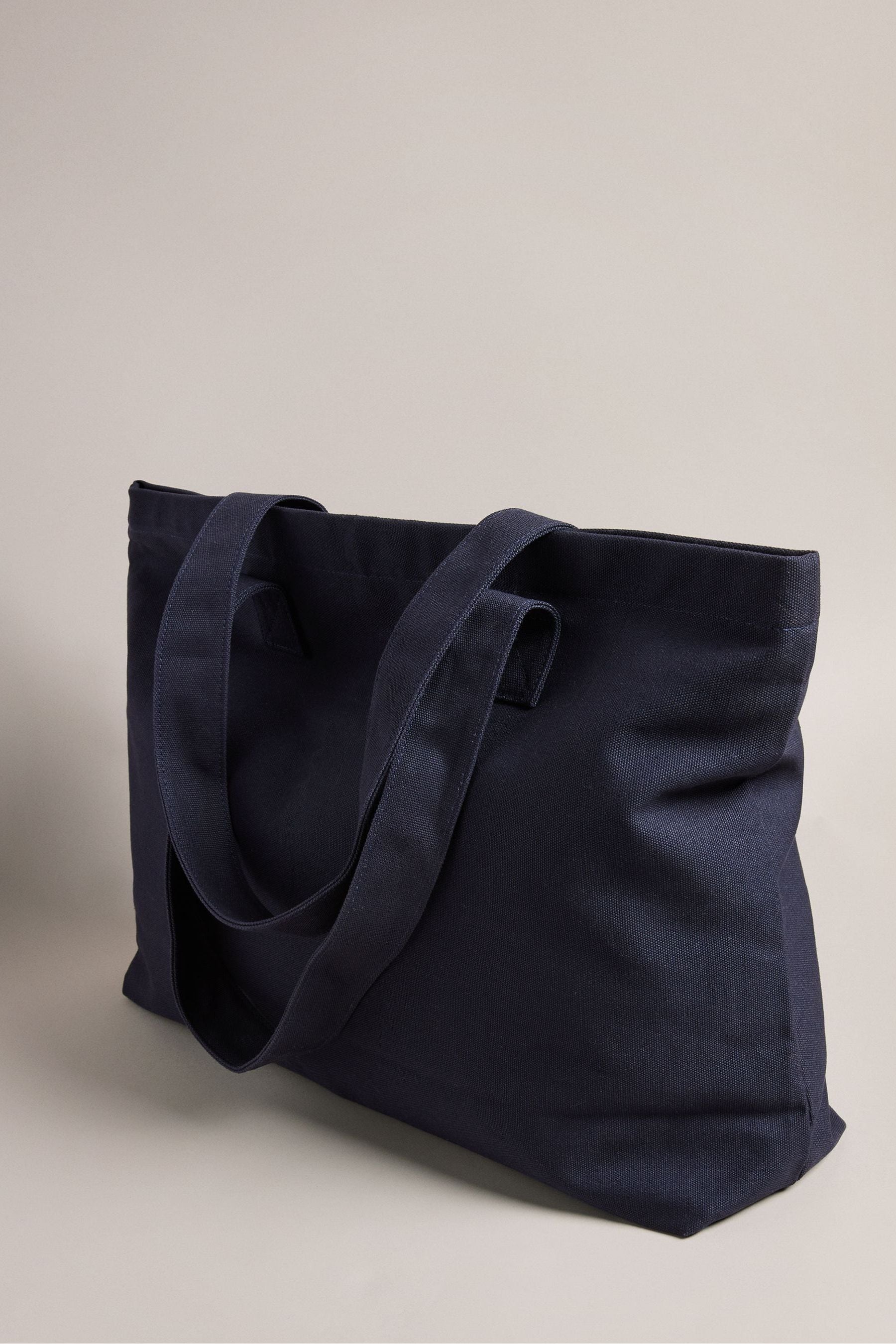 Blue canvas deals bag