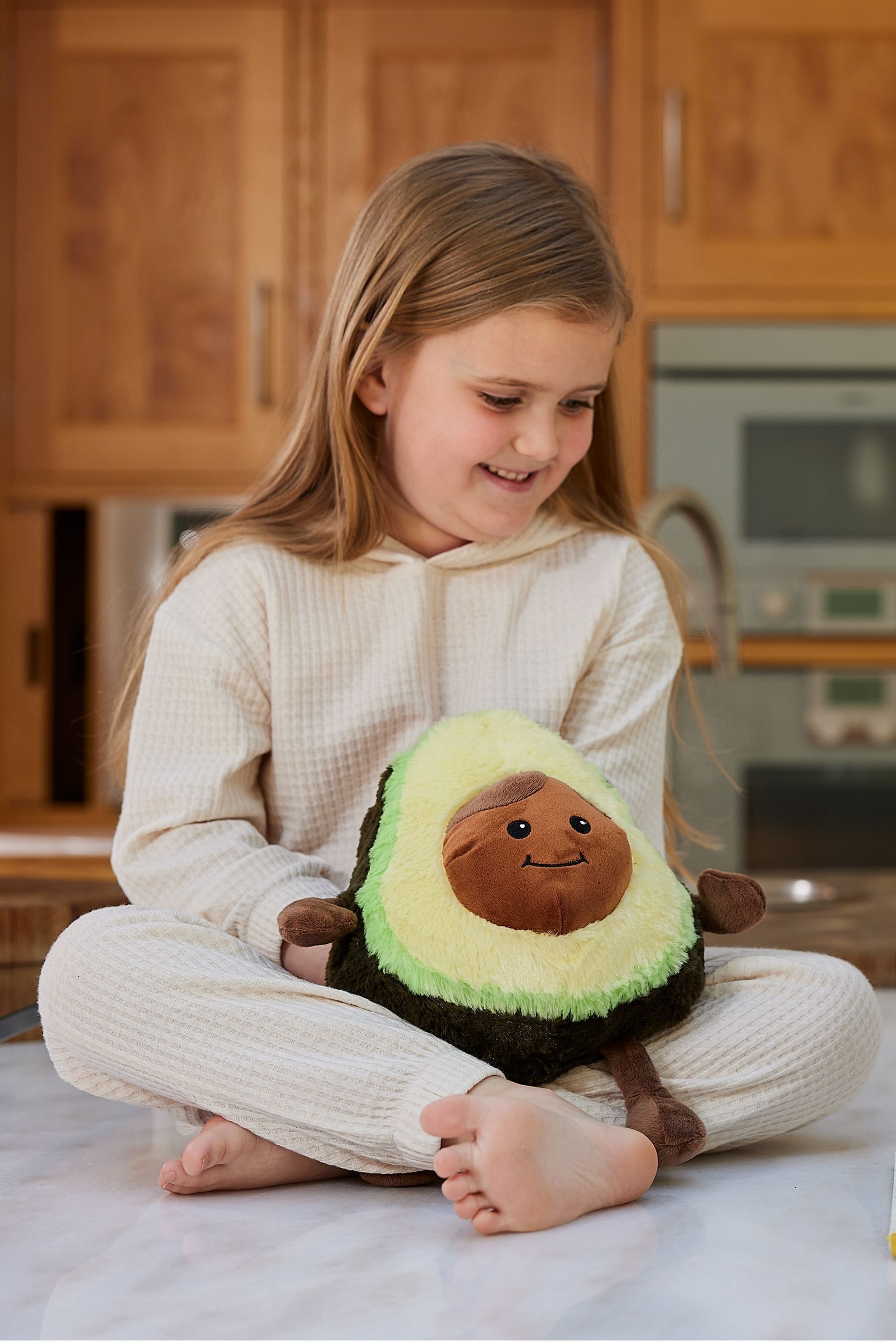 Buy Warmies Green Avocado Heatable Plush Toy from the Next UK