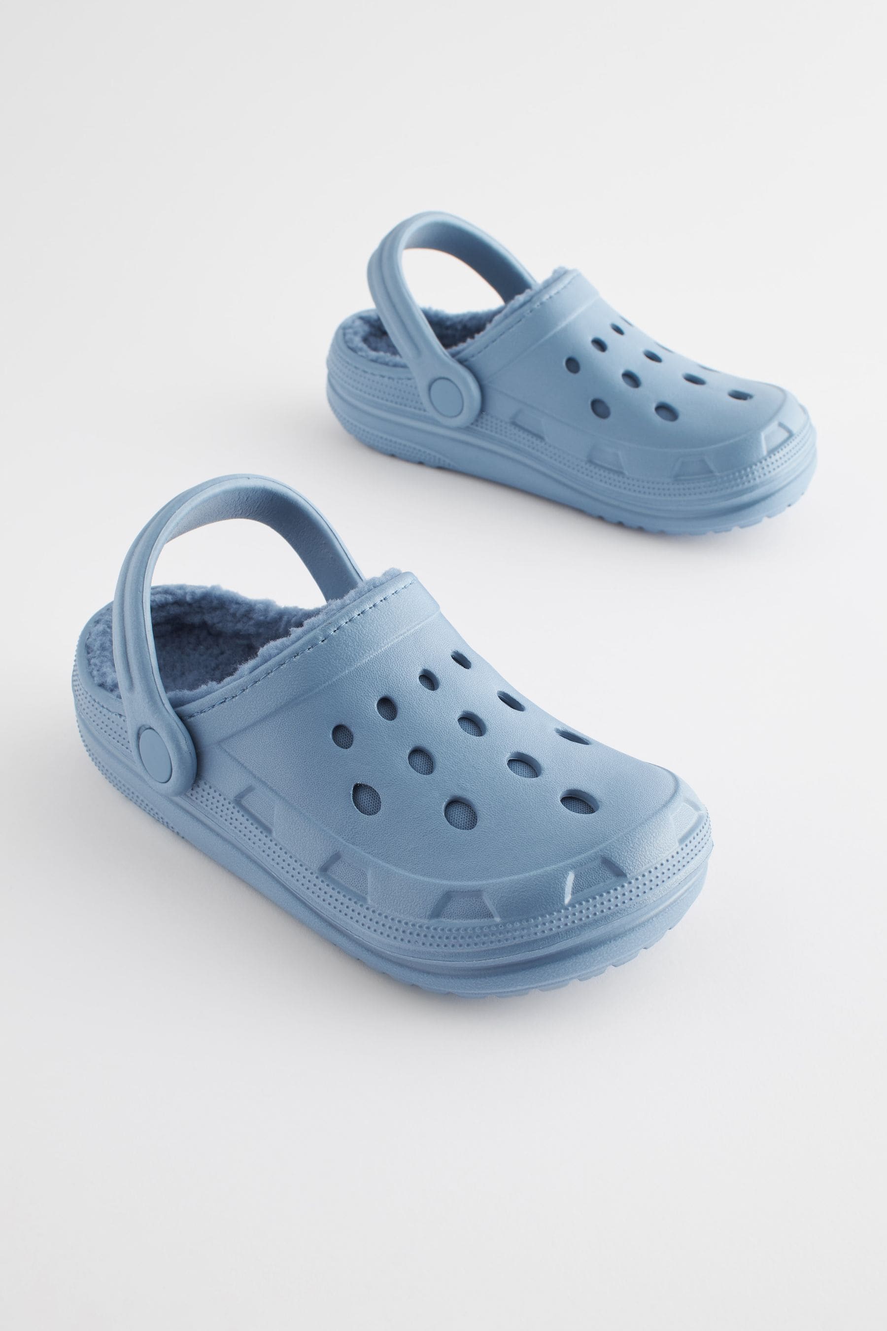 Light blue crocs with top fur