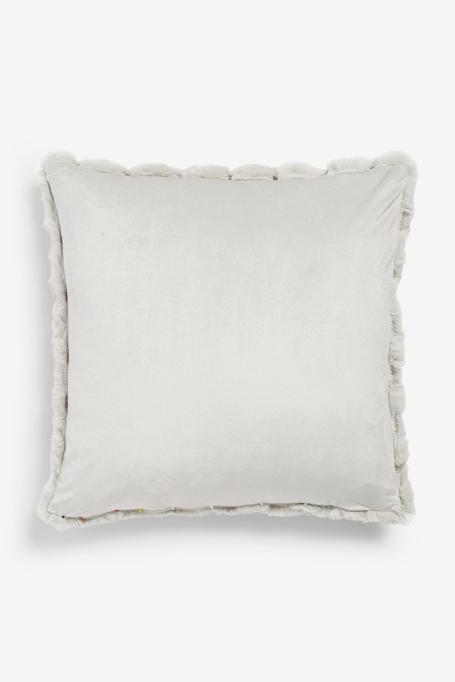 Faux fur cushions at next top
