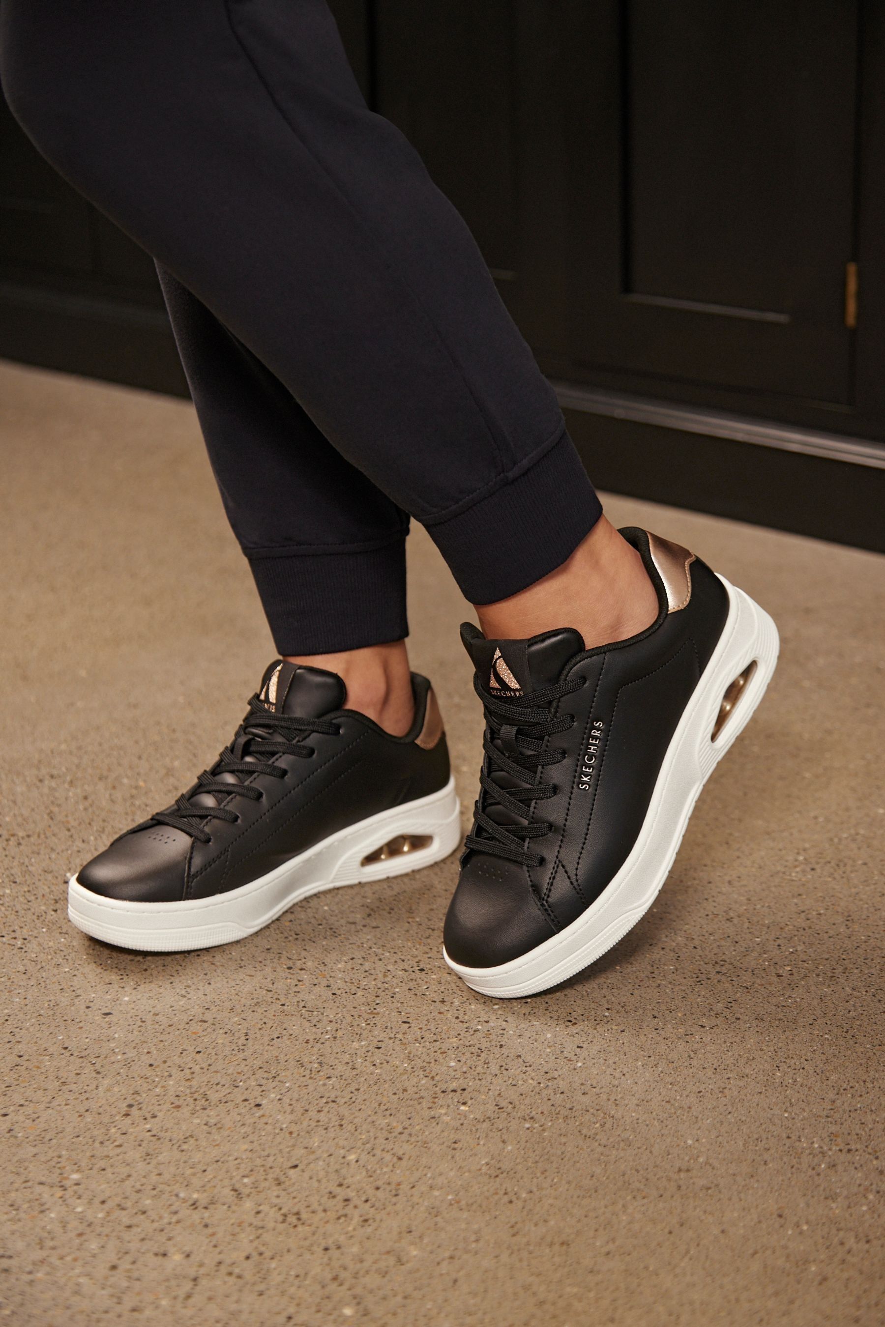 Buy Skechers Black Uno Court Trainers from the Next UK online shop