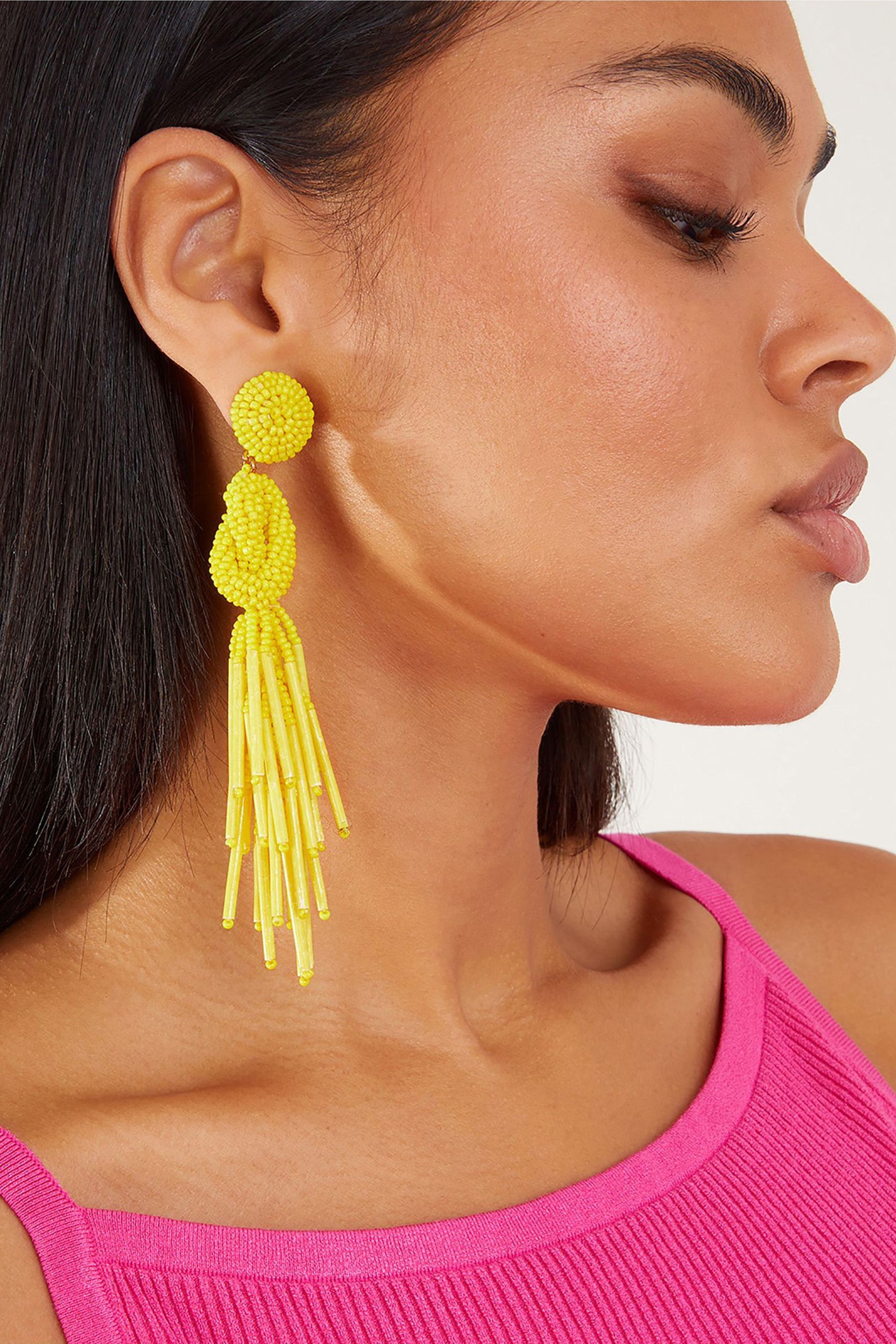 Buy Accessorize Yellow Statement Beaded Tassel Earrings from the
