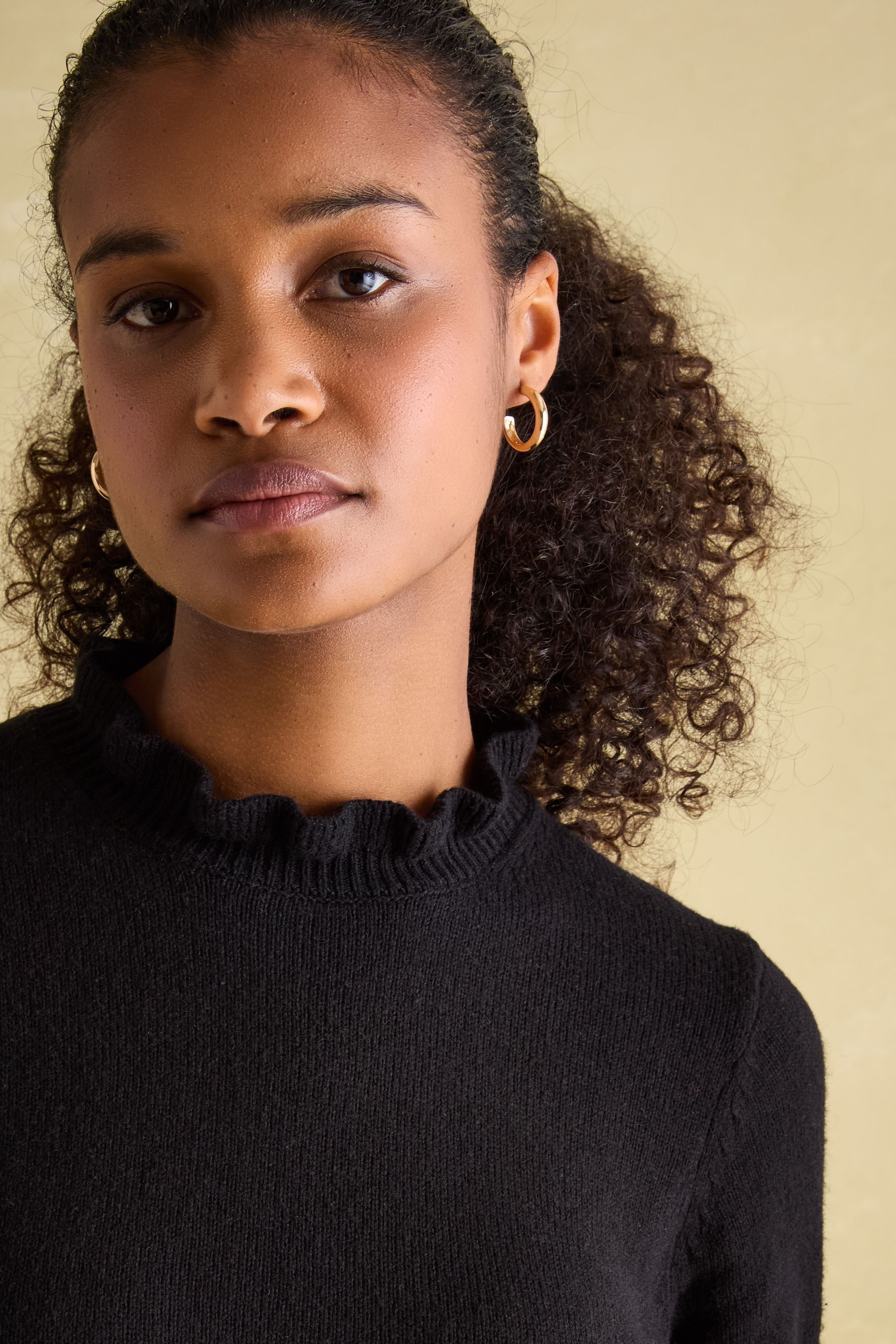 Black frill neck jumper on sale
