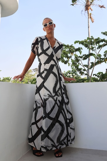 Religion White The Dusk Wrap Dress With Cap Sleeve in Abstract Print