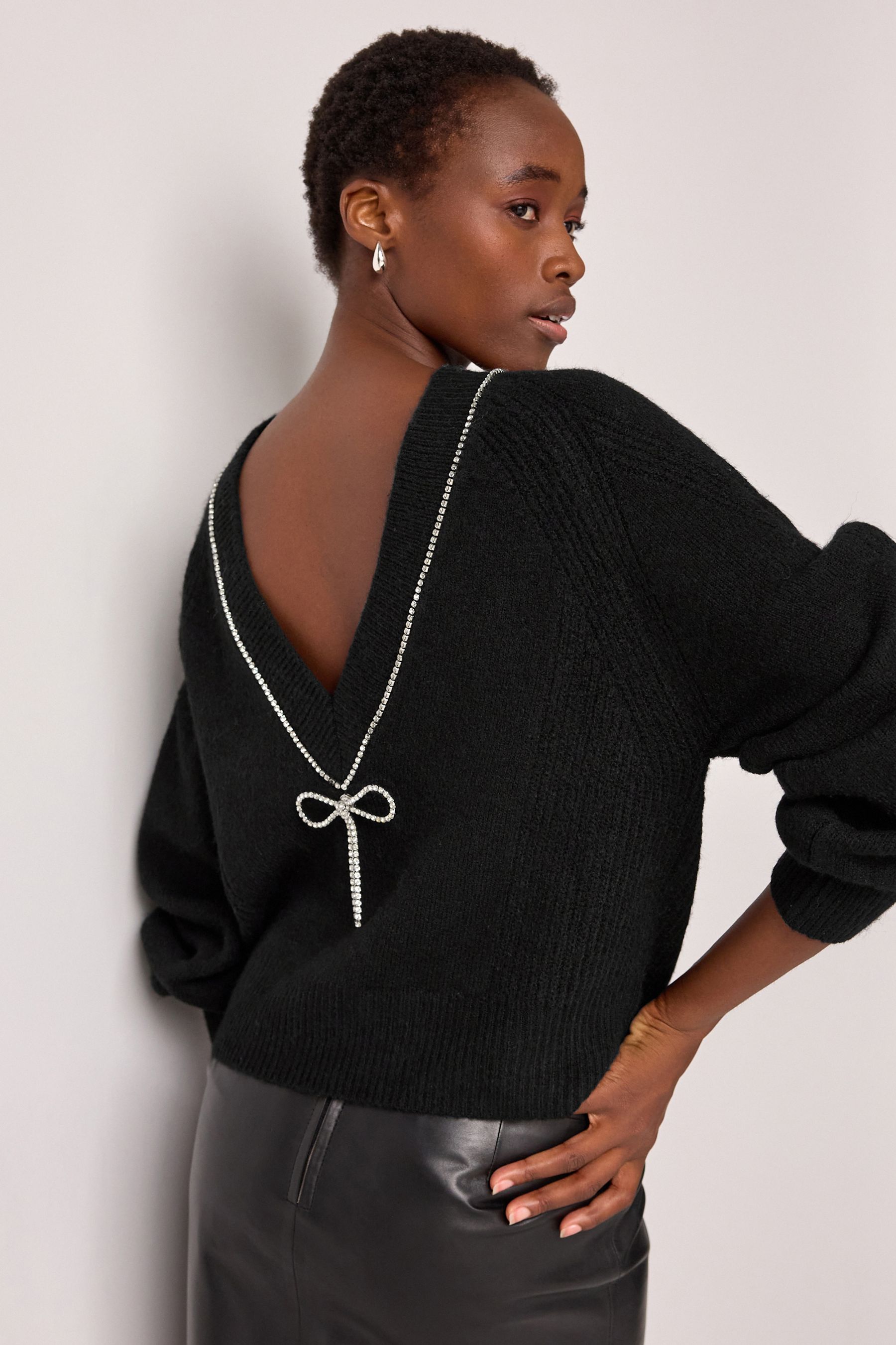 Buy Black Reversible Gem Bow Embellished Sparkle Knitted Jumper from the Next UK online shop