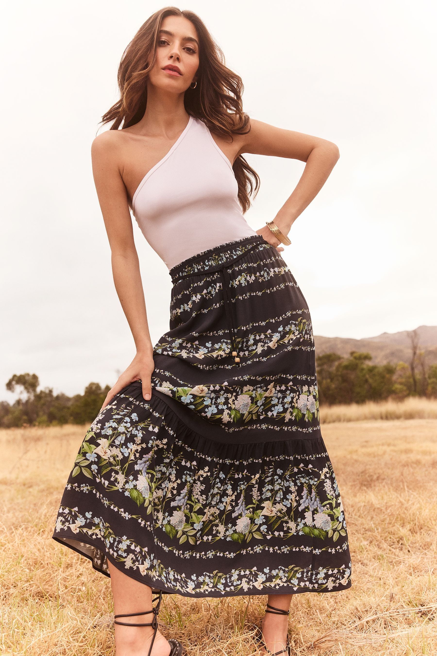 Buy Lipsy Black Floral Petite Printed Tiered Maxi Skirt from the Next UK online shop
