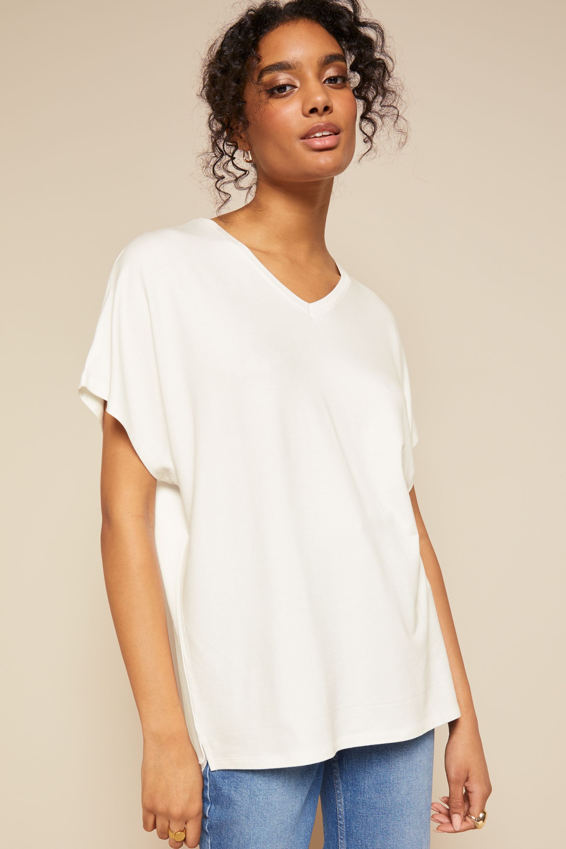 Buy Friends Like These Ivory Short Sleeve V Neck Tunic Top from