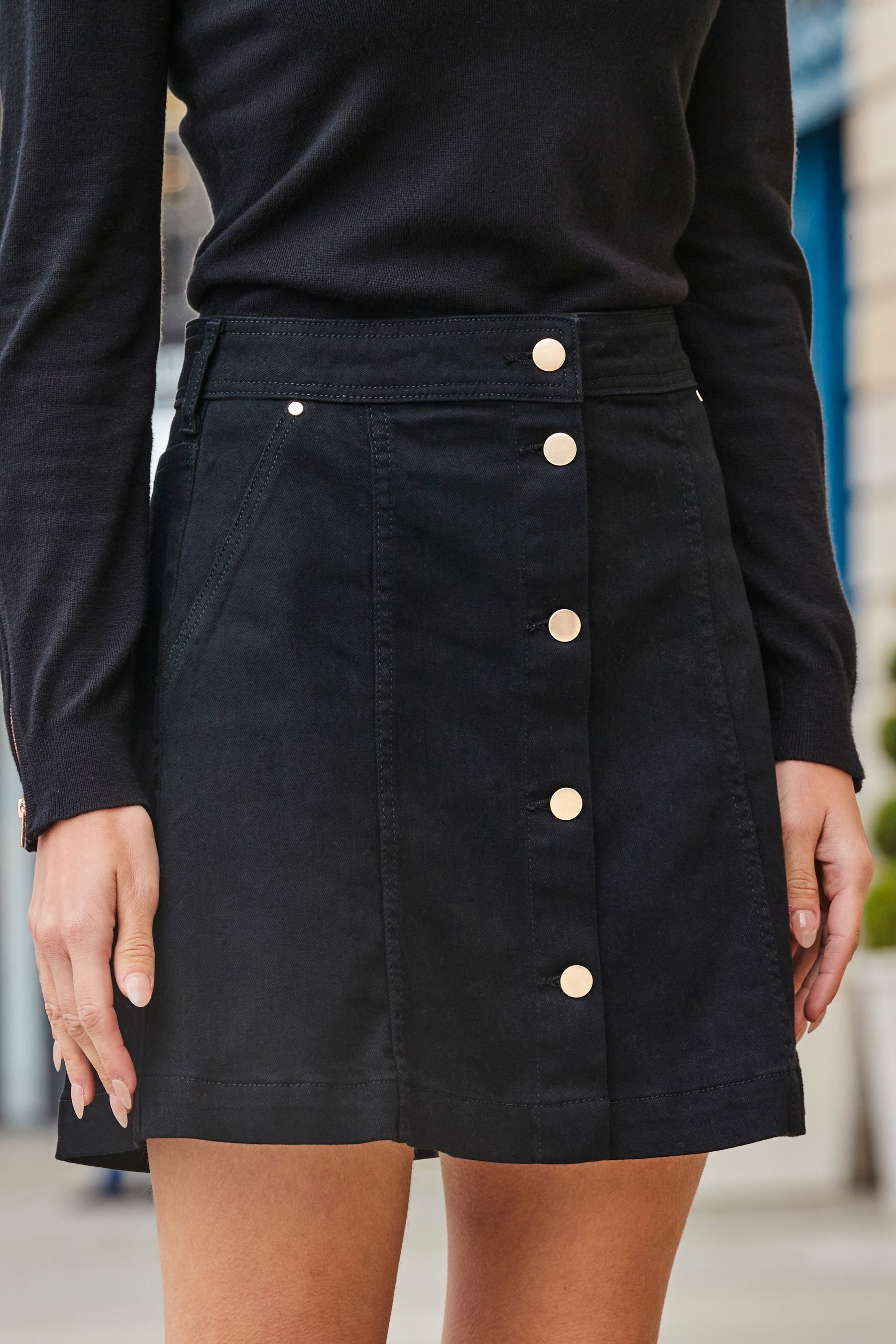 Black denim skirt button front top