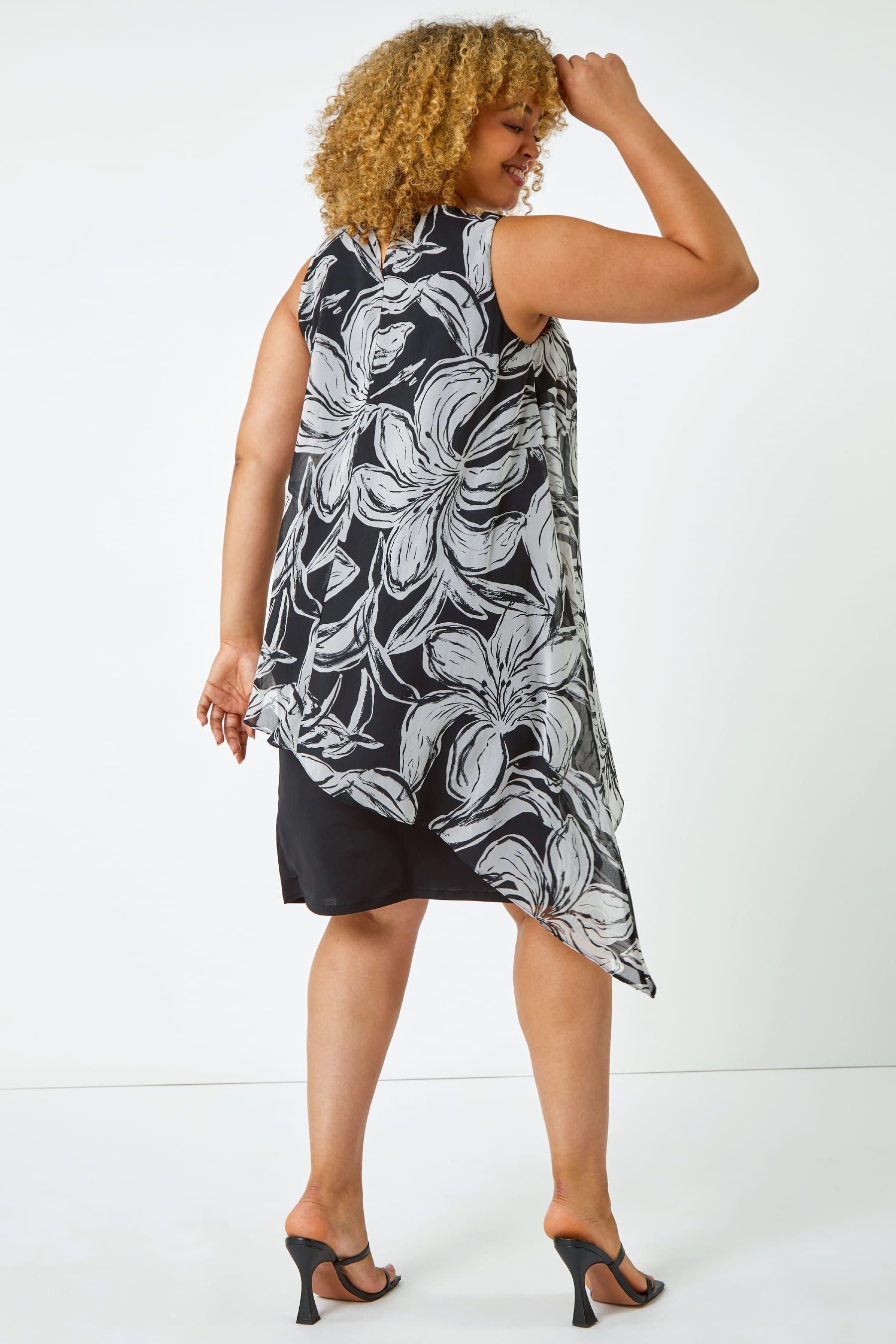 Black dress with floral overlay sale