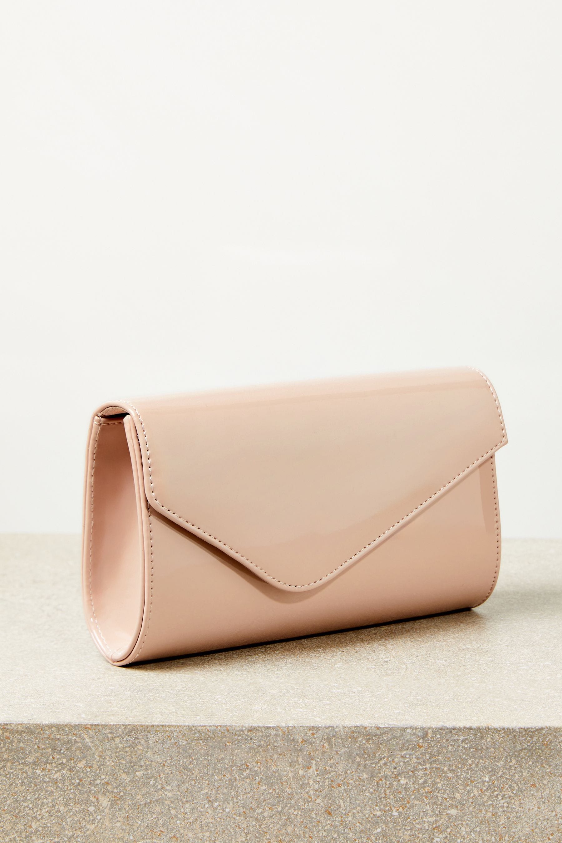 Buy Lipsy Nude Pink Asymmetric Foldover Chain Clutch Bag from the Next UK online shop