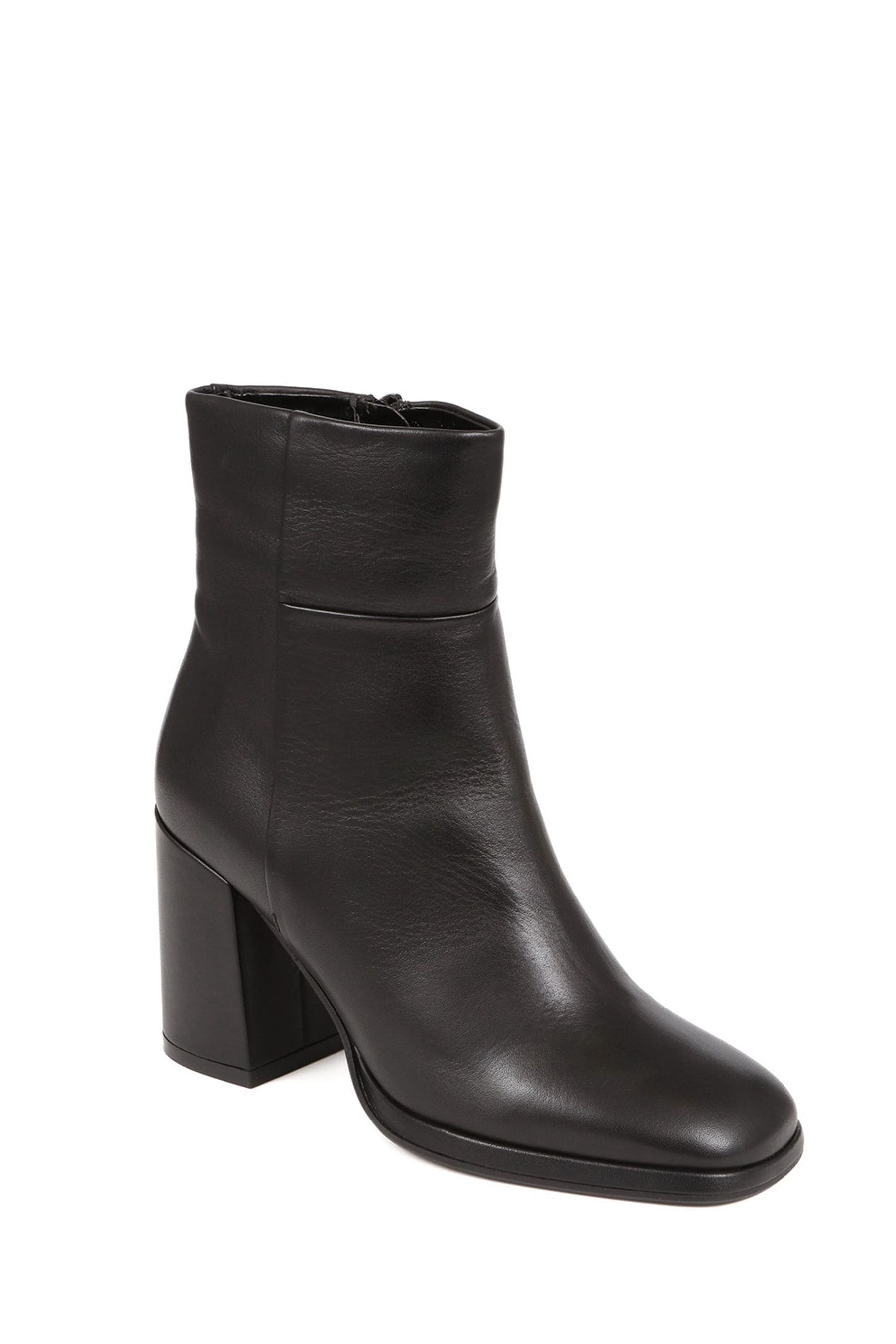 Black leather heeled ankle boots top