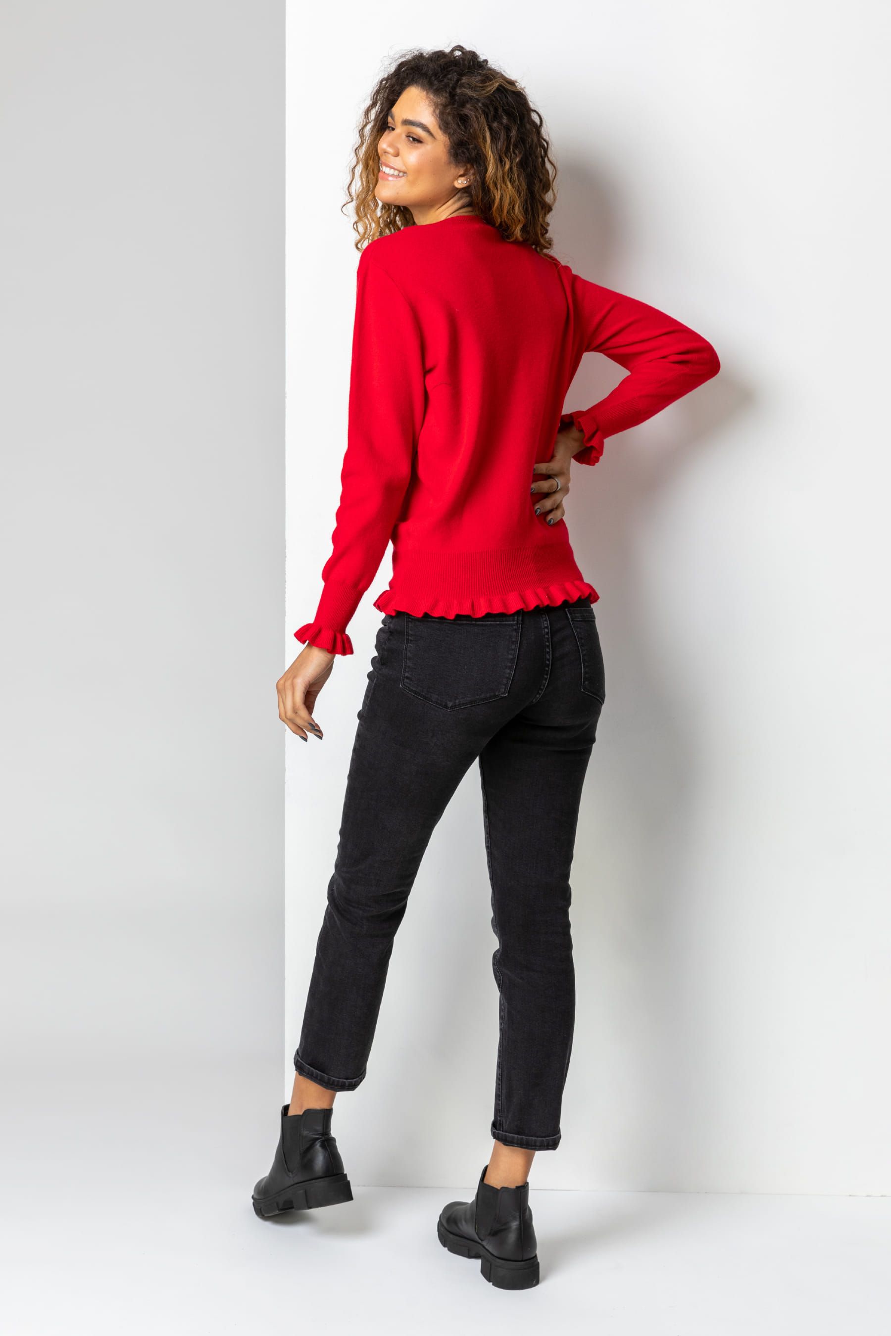 Red jumper top with pearls