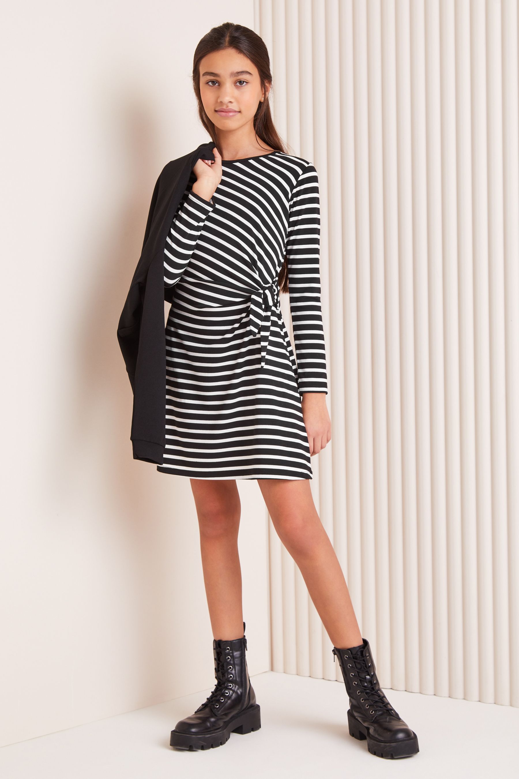 Black dress with white stripe sale on side