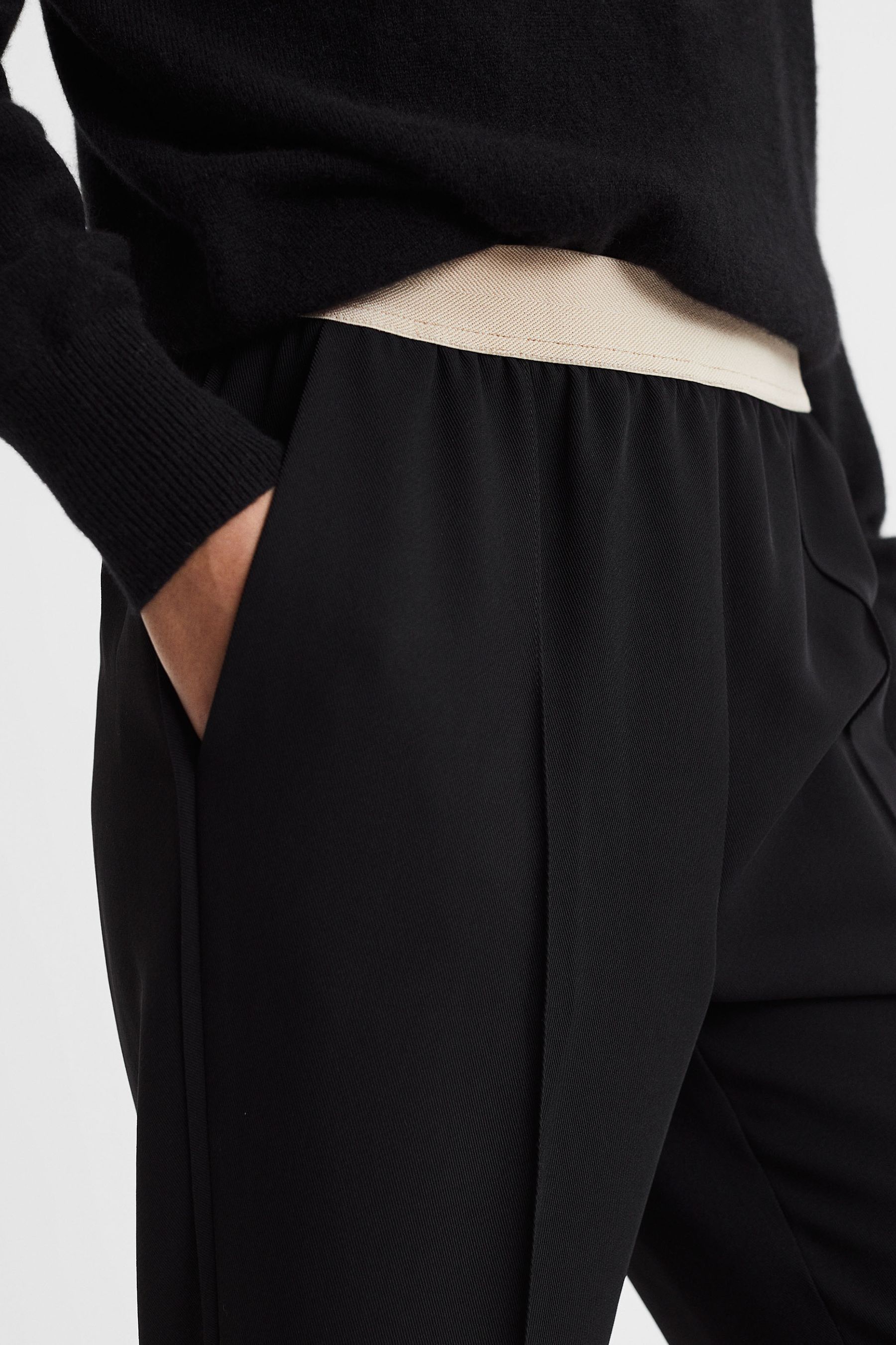 Elastic waist tapered trousers online