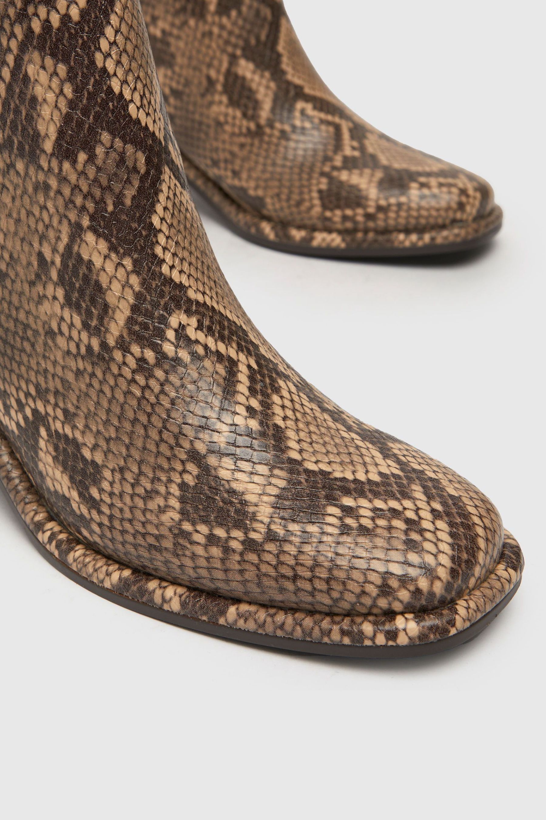Snake block cheap heel boots