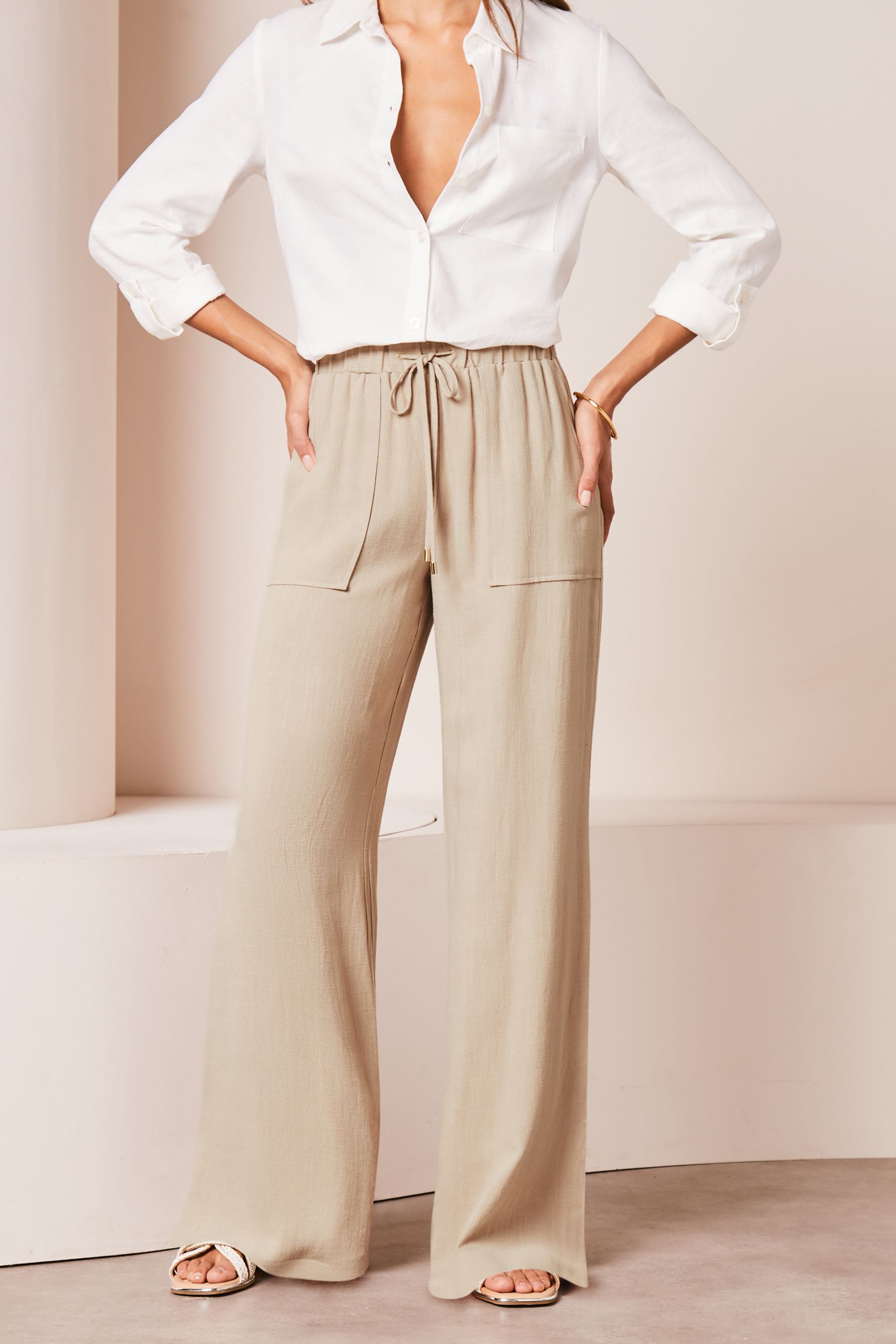 Ladies cream wide leg trousers store