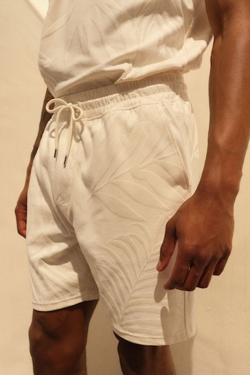 Ecru White Textured Floral Jersey Shorts