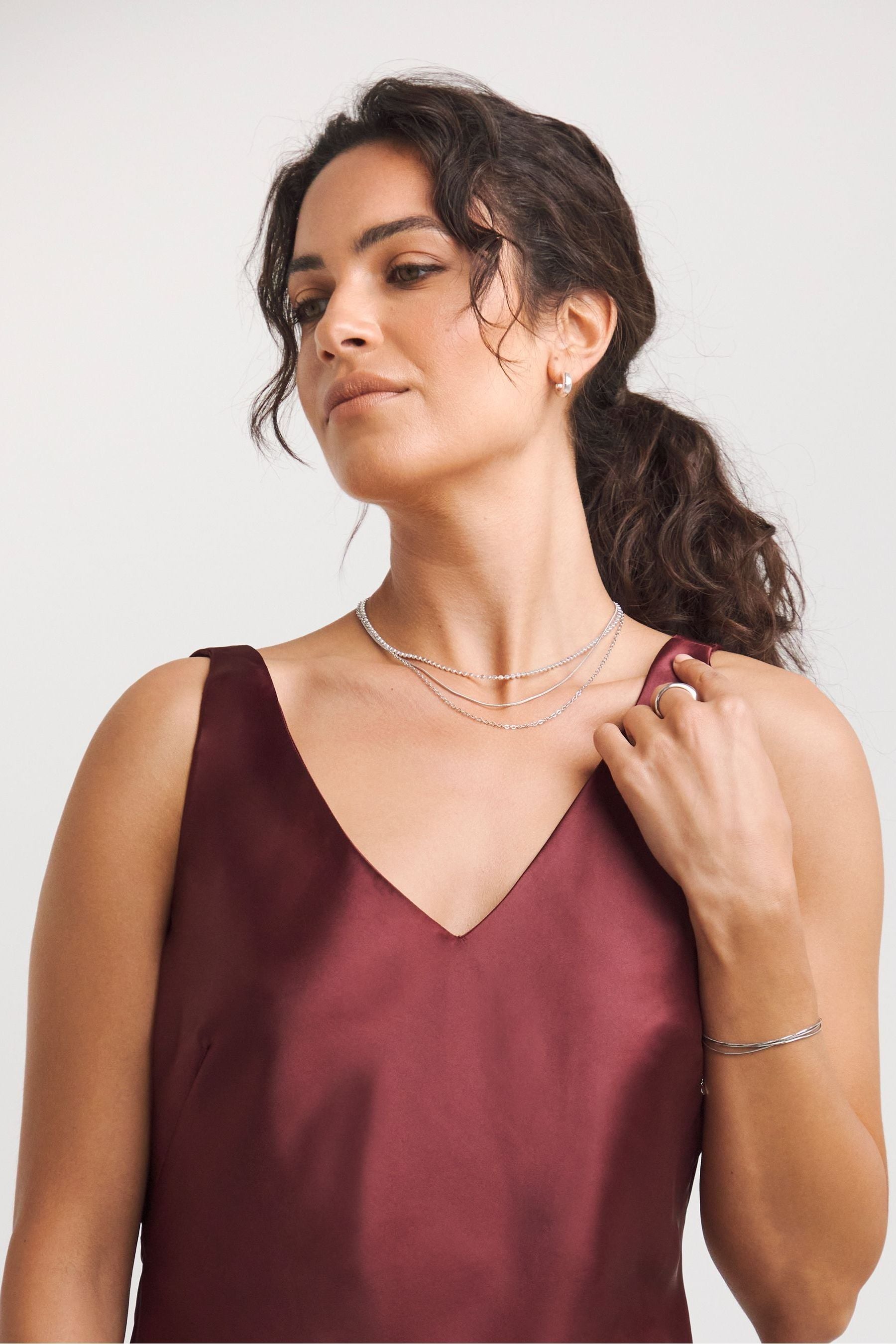 Red cami best sale outfit