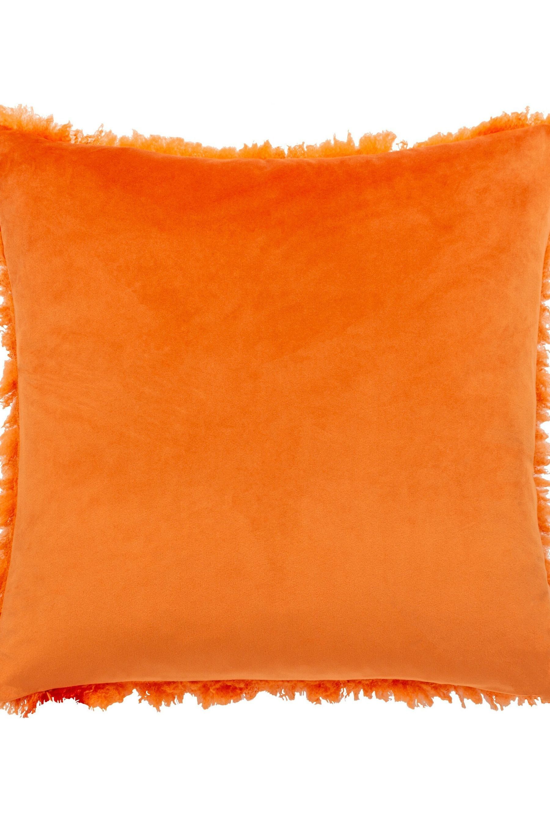 Orange shop fur cushions