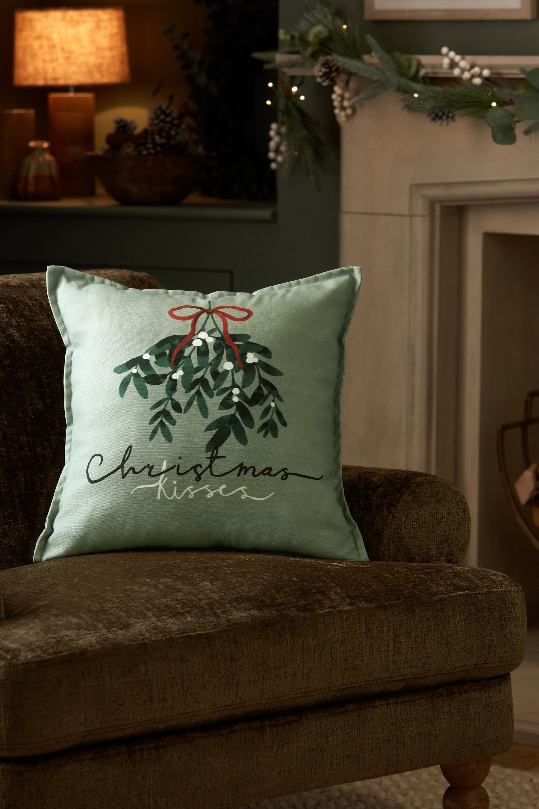 Buy Sage Green Mistletoe Christmas Kisses Cushion from the Next UK