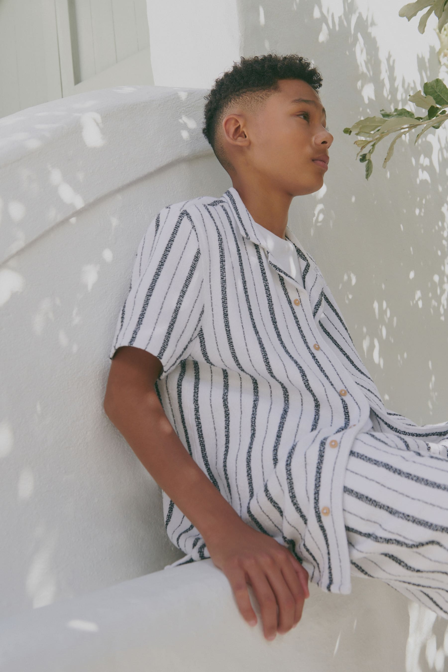 Black and white striped overall shorts top