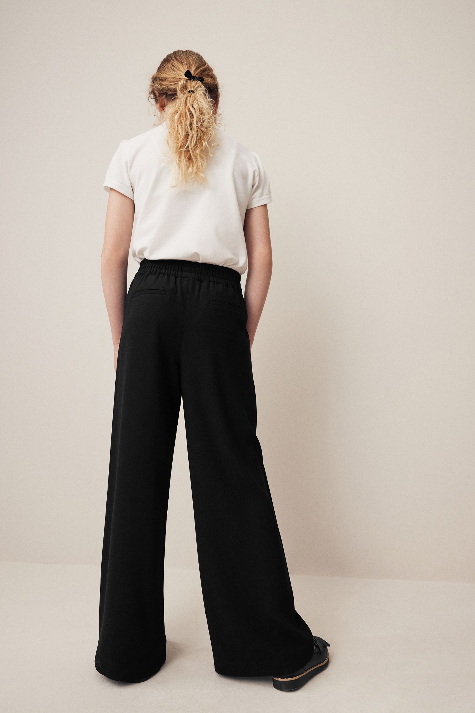 Buy Black Crepe Pull On Wide Leg Trousers 9 18yrs from the Next UK online shop