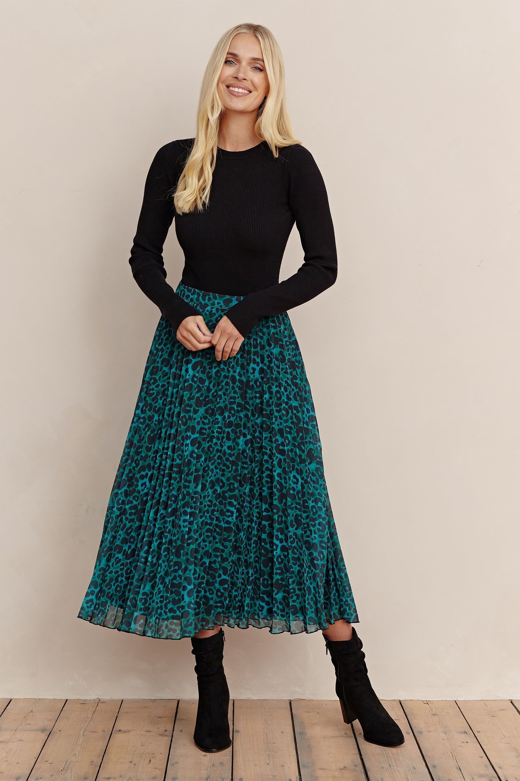 Buy Society 8 Vesper Green Animal Print Pleated Skirt from the